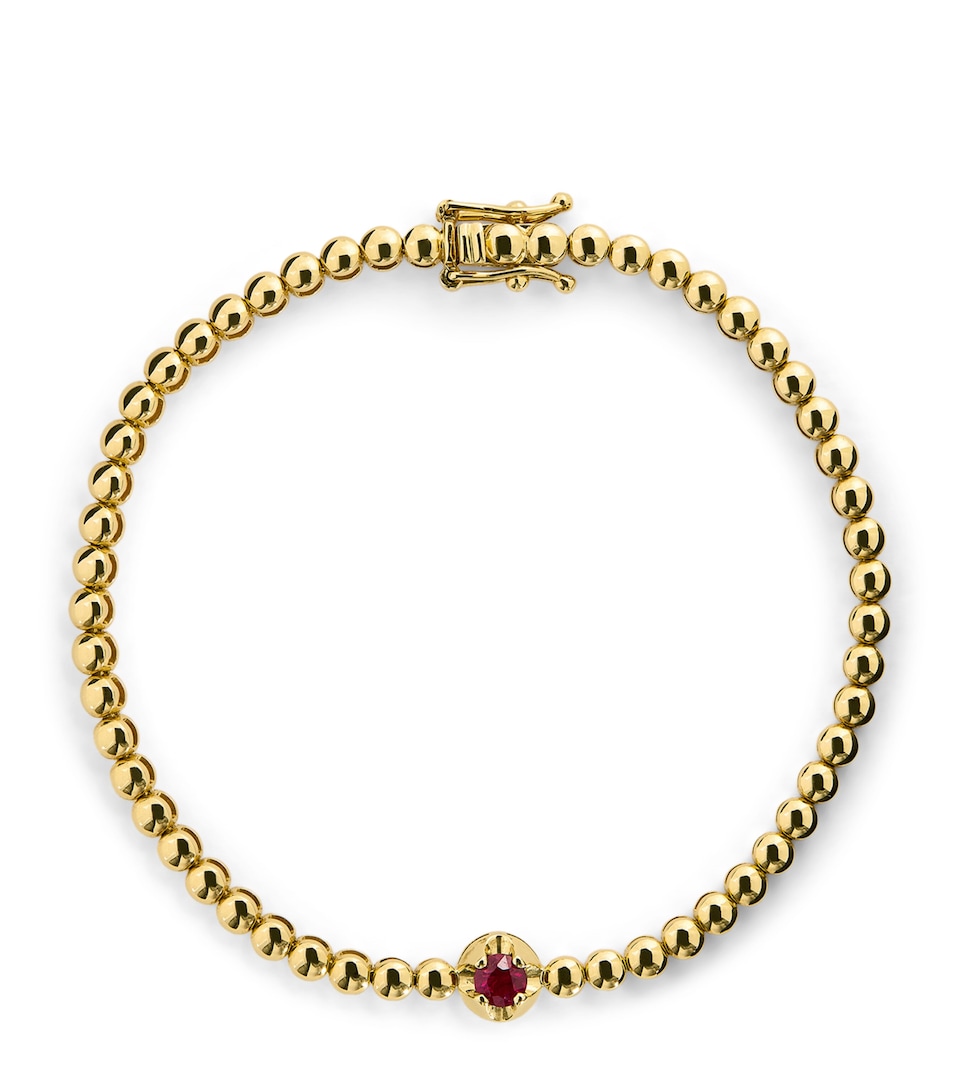 Yellow Gold and Ruby Illusion Tennis Bracelet