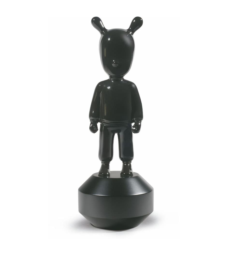 The Black Guest Figurine