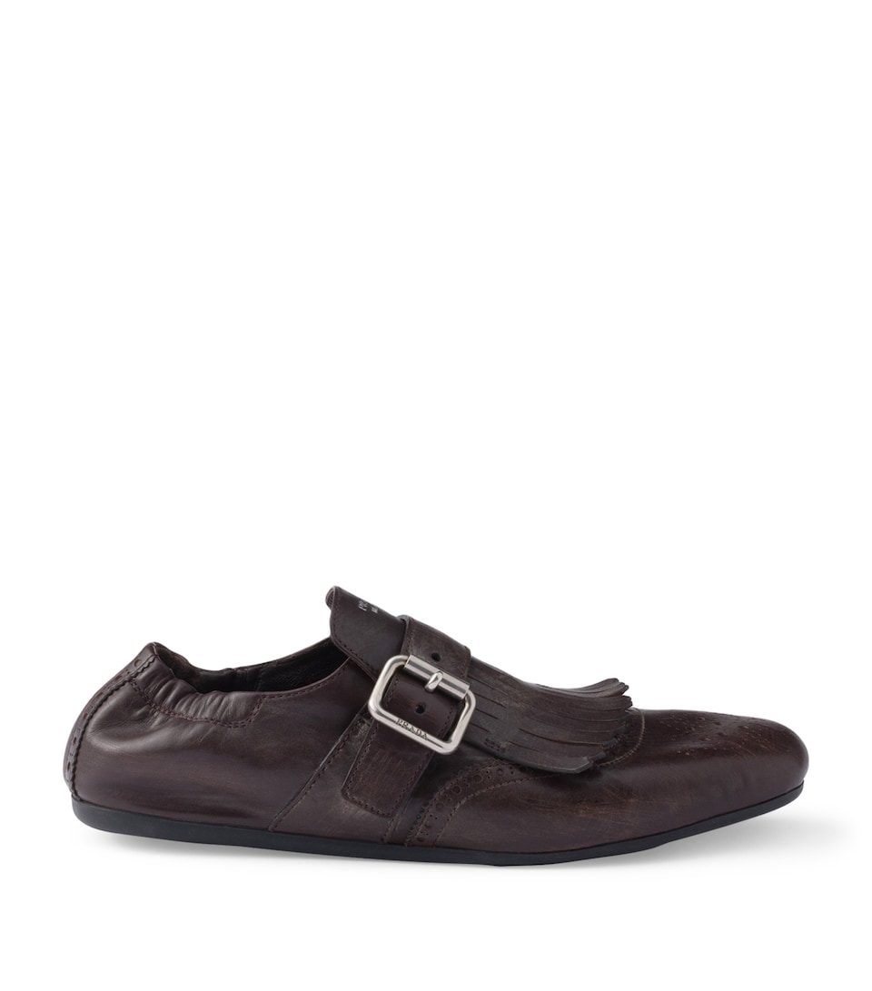 Leather Fringed Shuffle Loafers