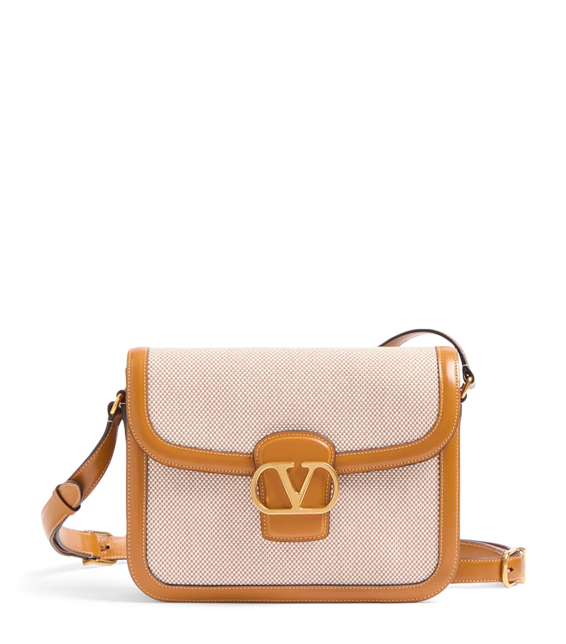 バッグ・カバンその他 Valentino Garavani Small 9TO5 bag in bordeaux Valentino Garavani Small 9TO5 bag in bordeaux | TheDoubleF