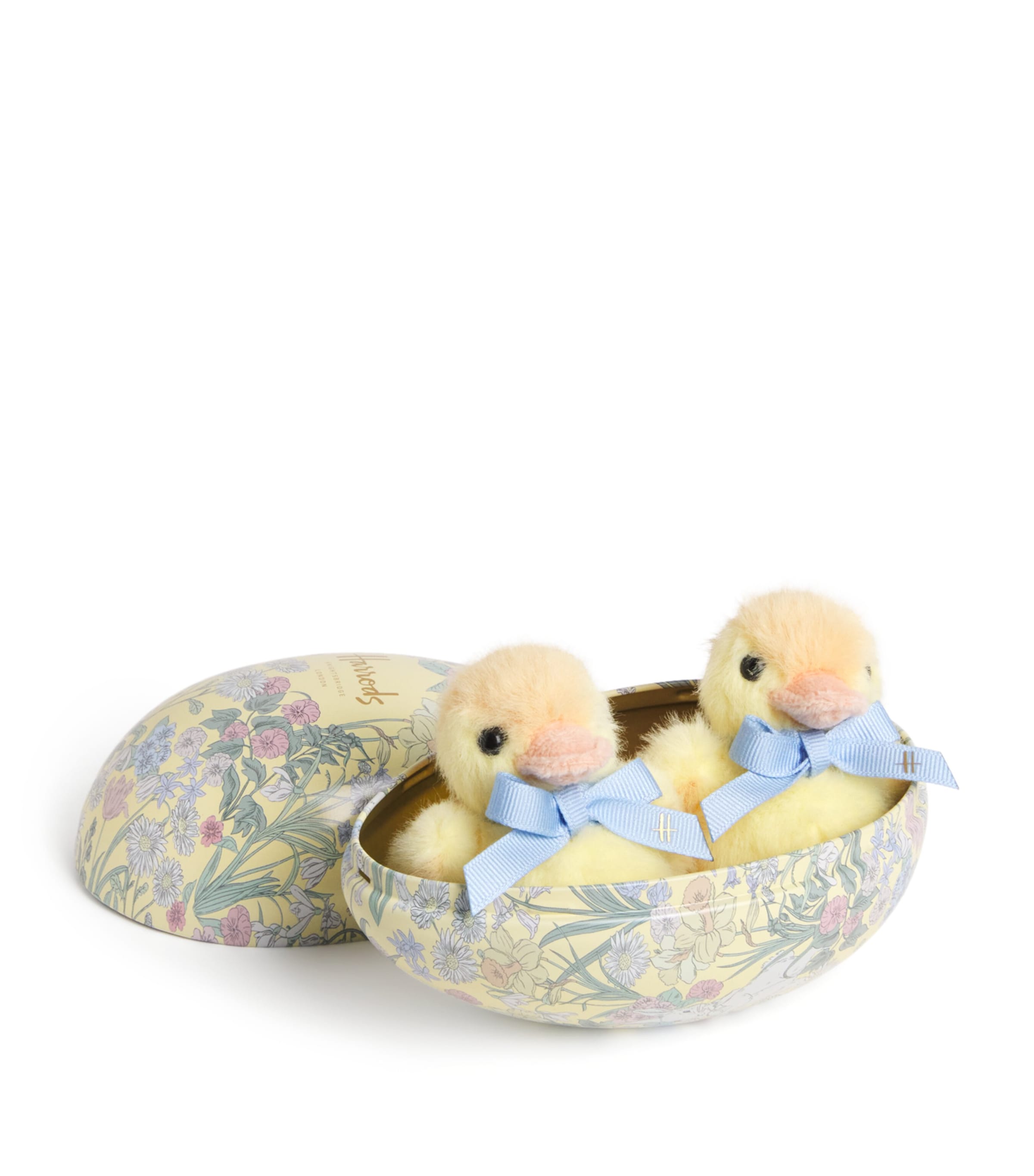Plush Chicks in a Tin Egg