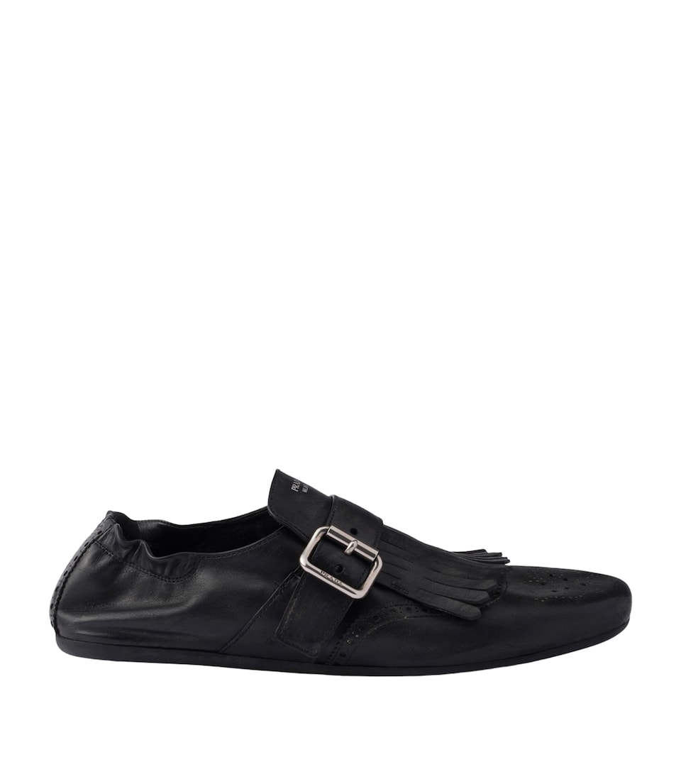 Leather Fringed Shuffle Loafers