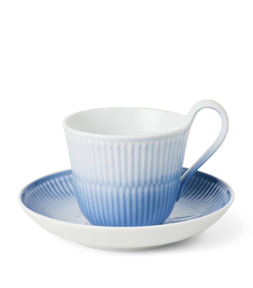 Royal Copenhagen Porcelain Iris Cup and Saucer Blue