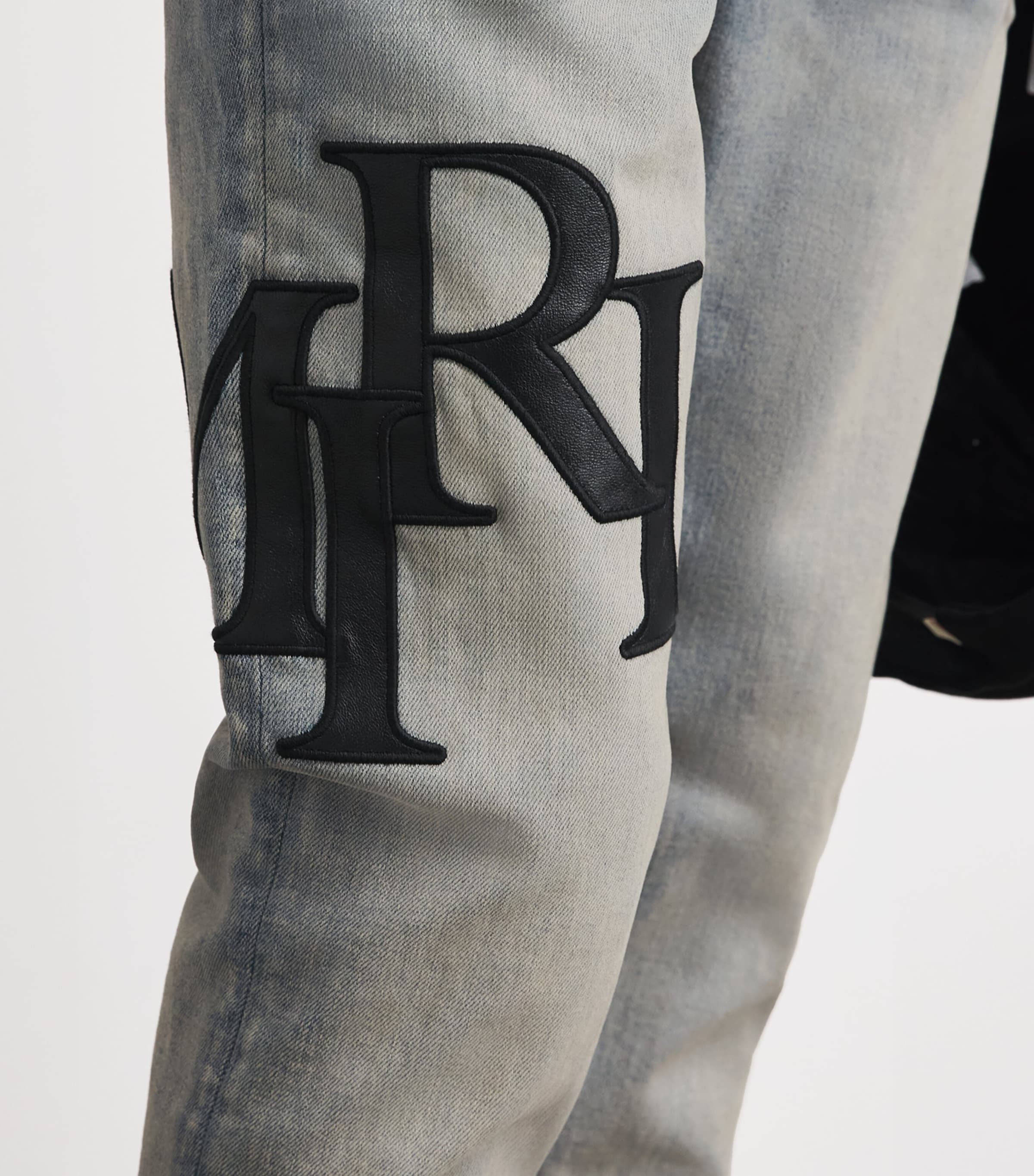 AMIRI Mens Staggered Logo Skinny Jeans Antique Indigo Black Image 3