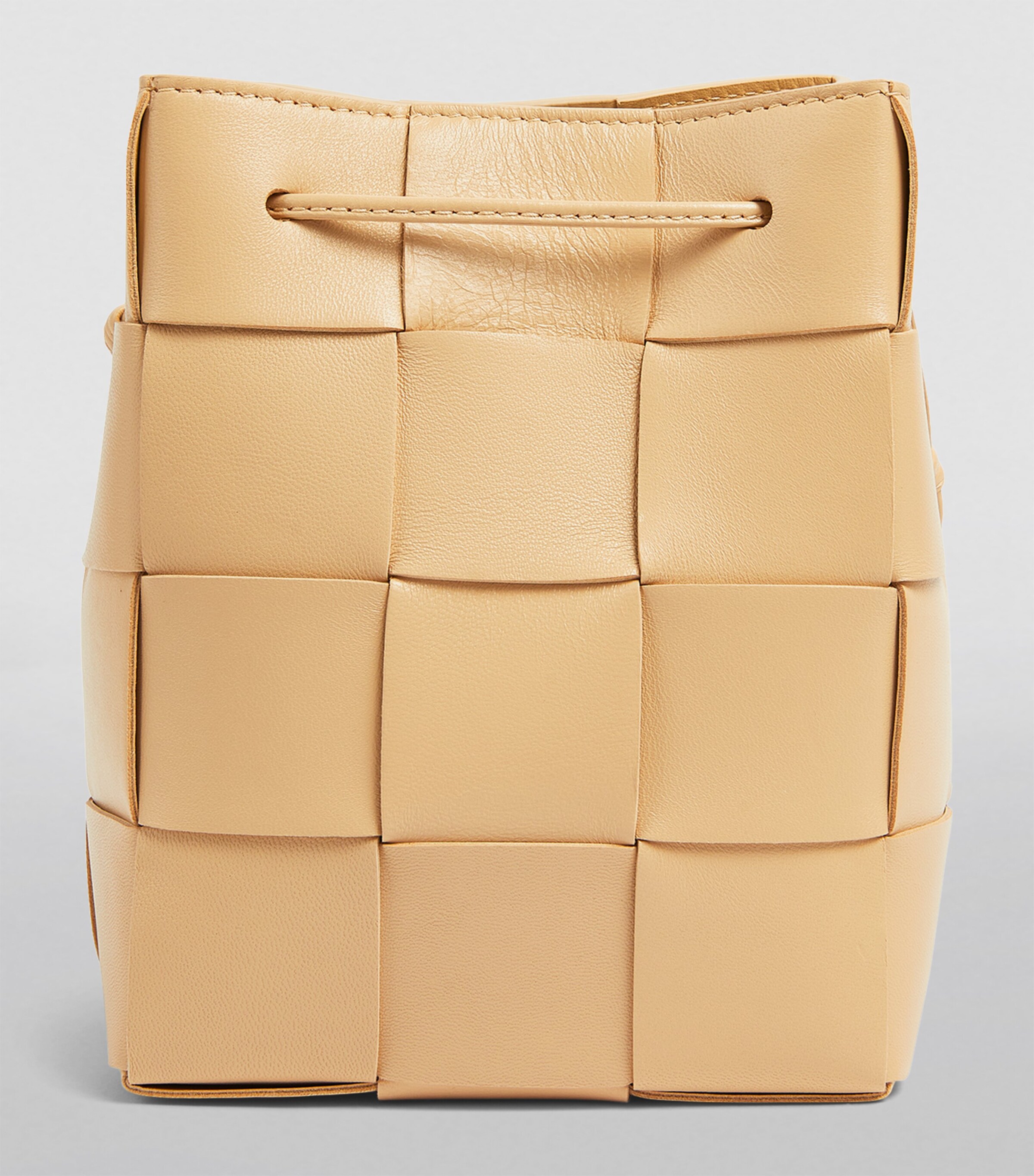 【BOTTEGA VENETA】Small Leather Cassette Bucket Bag Sunburst Bottega Veneta Small Leather Cassette Bucket Bag | Harrods US