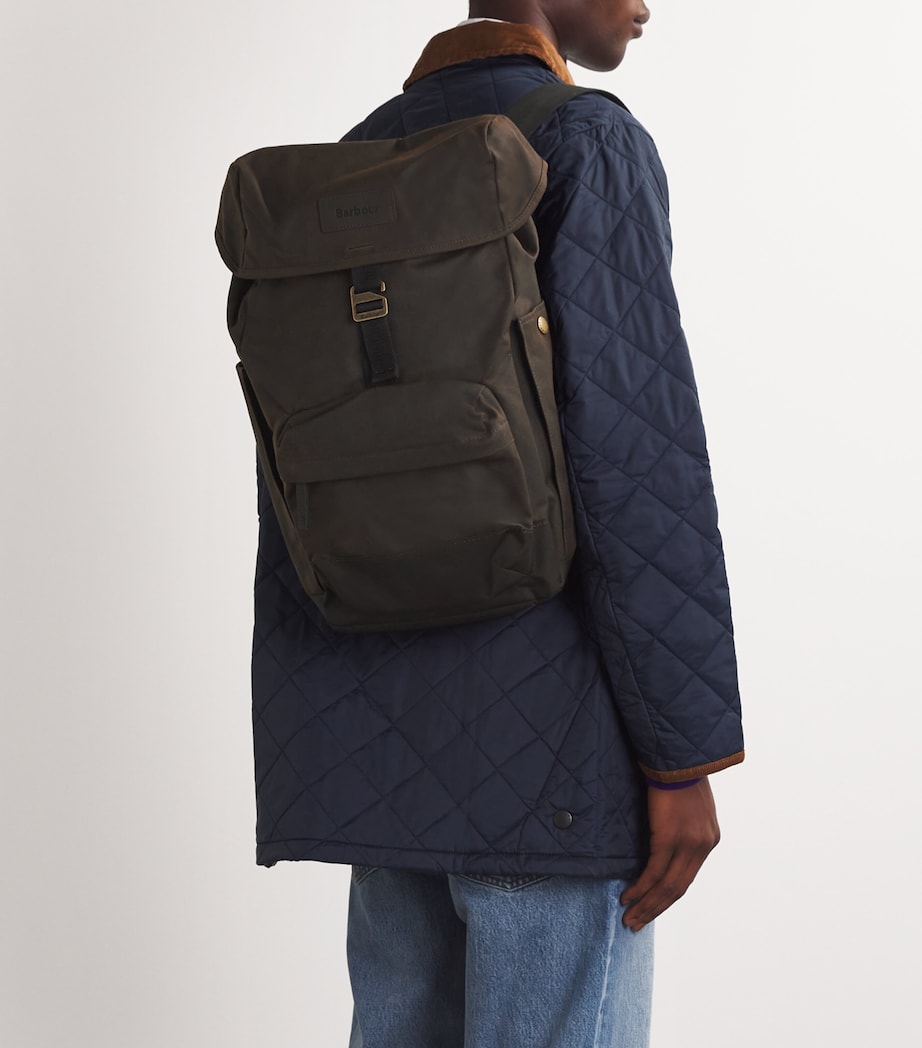 barbour traveller waxed cotton backpack Field Wax it boasts an outer front zipped pocket for quick access to essentials and an inner laptop section to keep your technology protected Barbour Transport Foldover Top Cotton