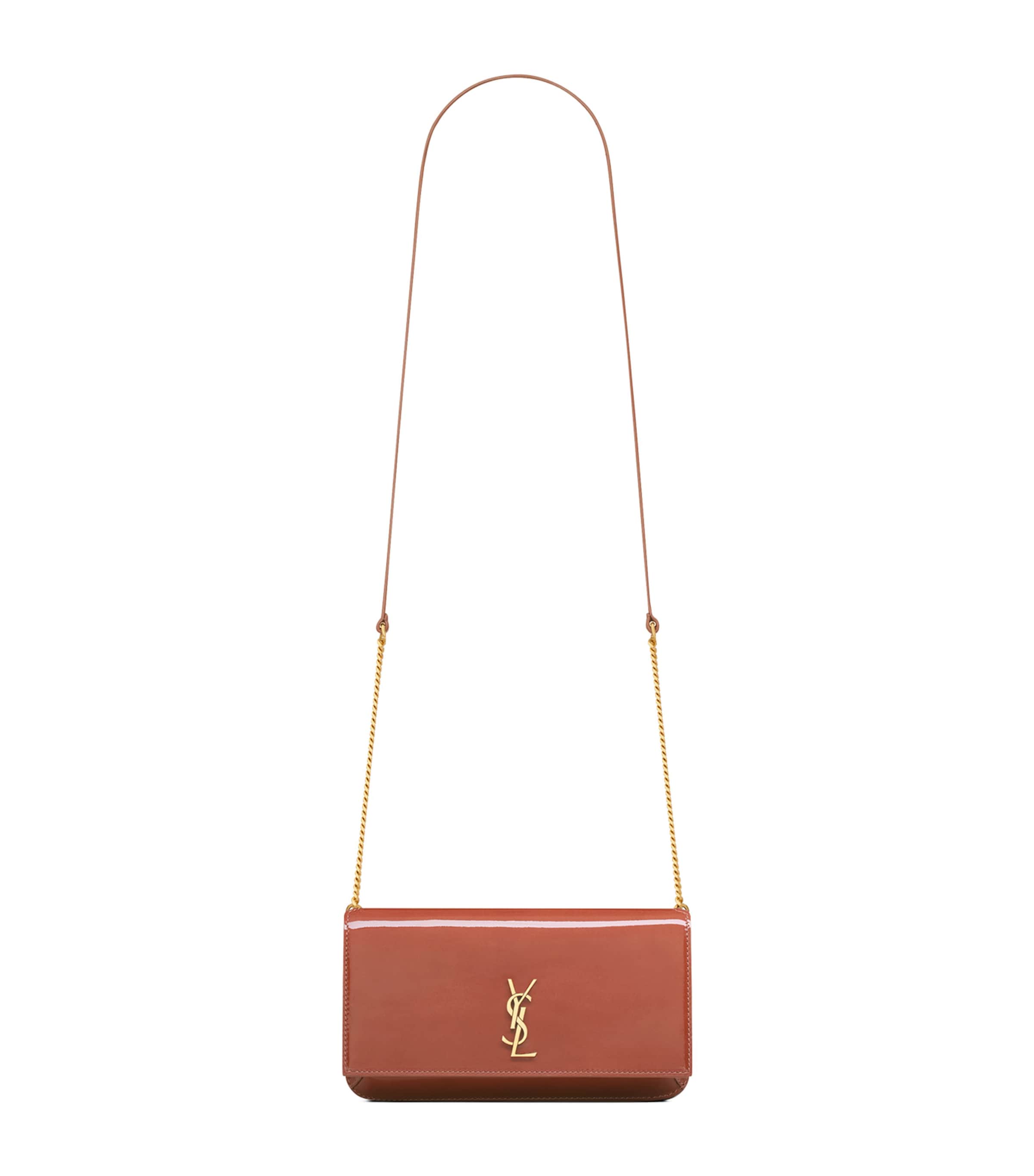 Saint Laurent Patent Leather Cassandre Phone Holder In Pink