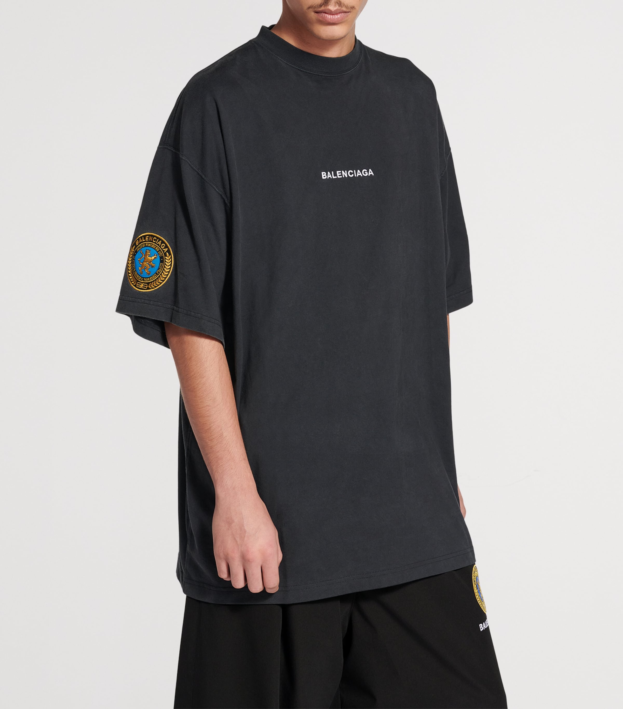 Balenciaga Oversized Cotton Uniform Logo T-Shirt | Harrods UK
