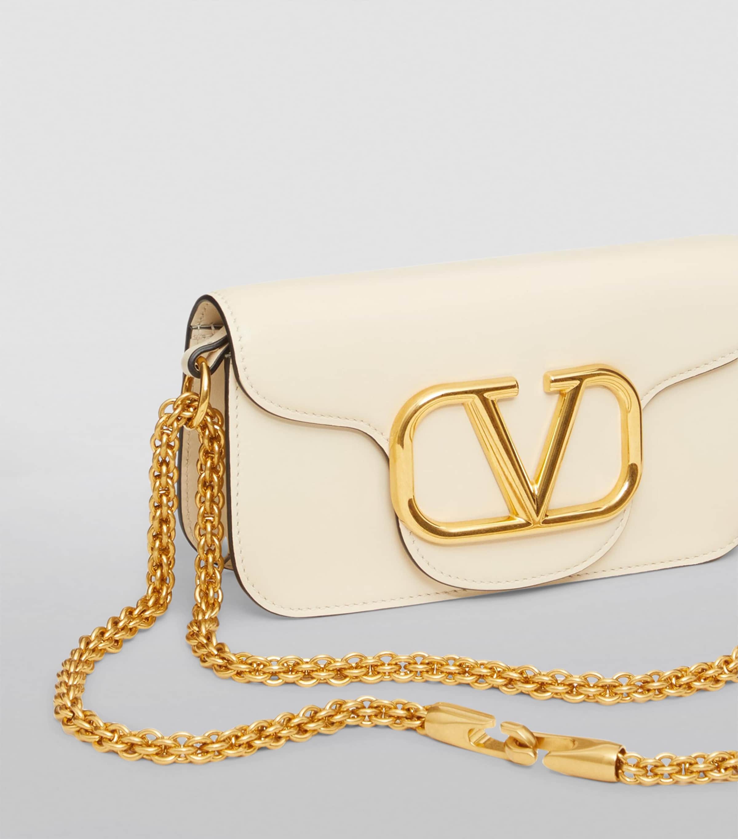 Valentino Garavani Small Leather Locò Shoulder Bag | Harrods US