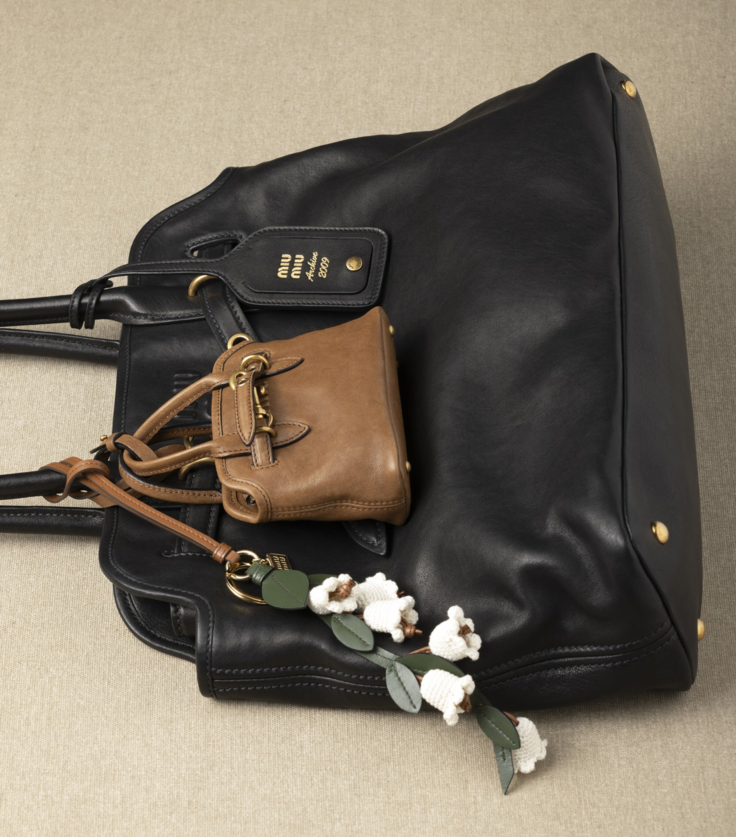 Miu Miu Brown Lambskin Aventure Handbag Keychain | Harrods UK
