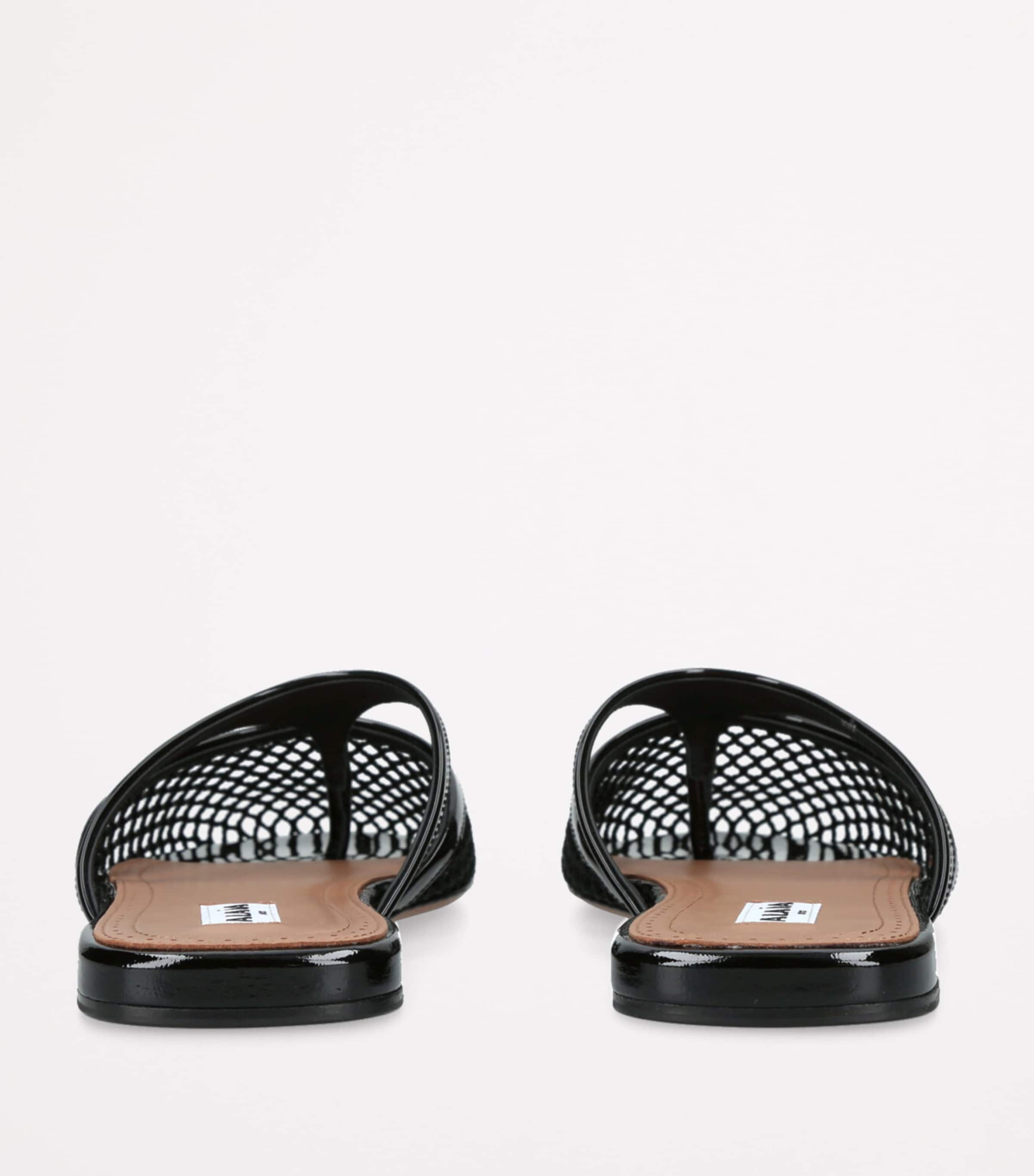 Alaïa Infradito Fishnet Flat Mules | Harrods US