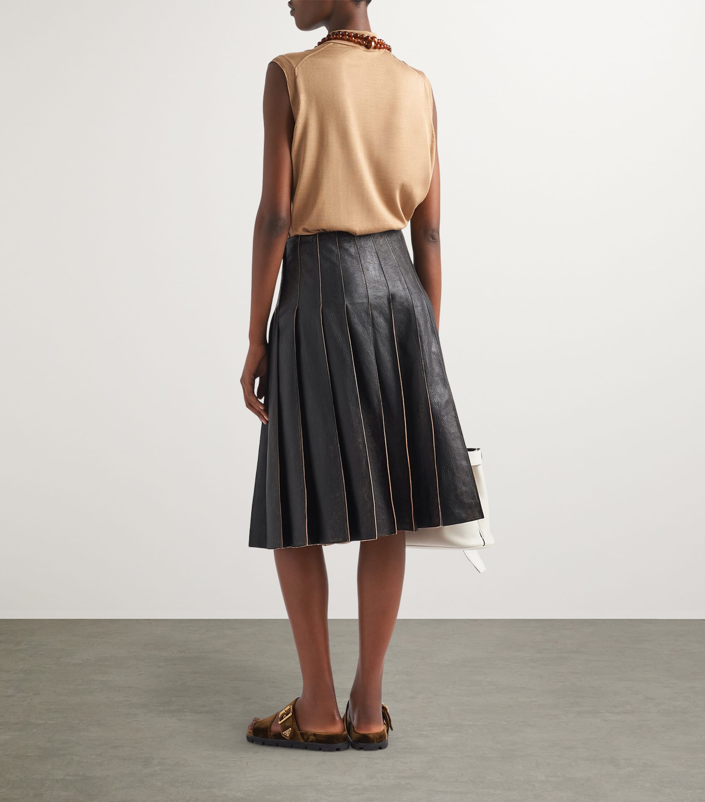 Prada Black Leather Pleated Midi Skirt | Harrods UK