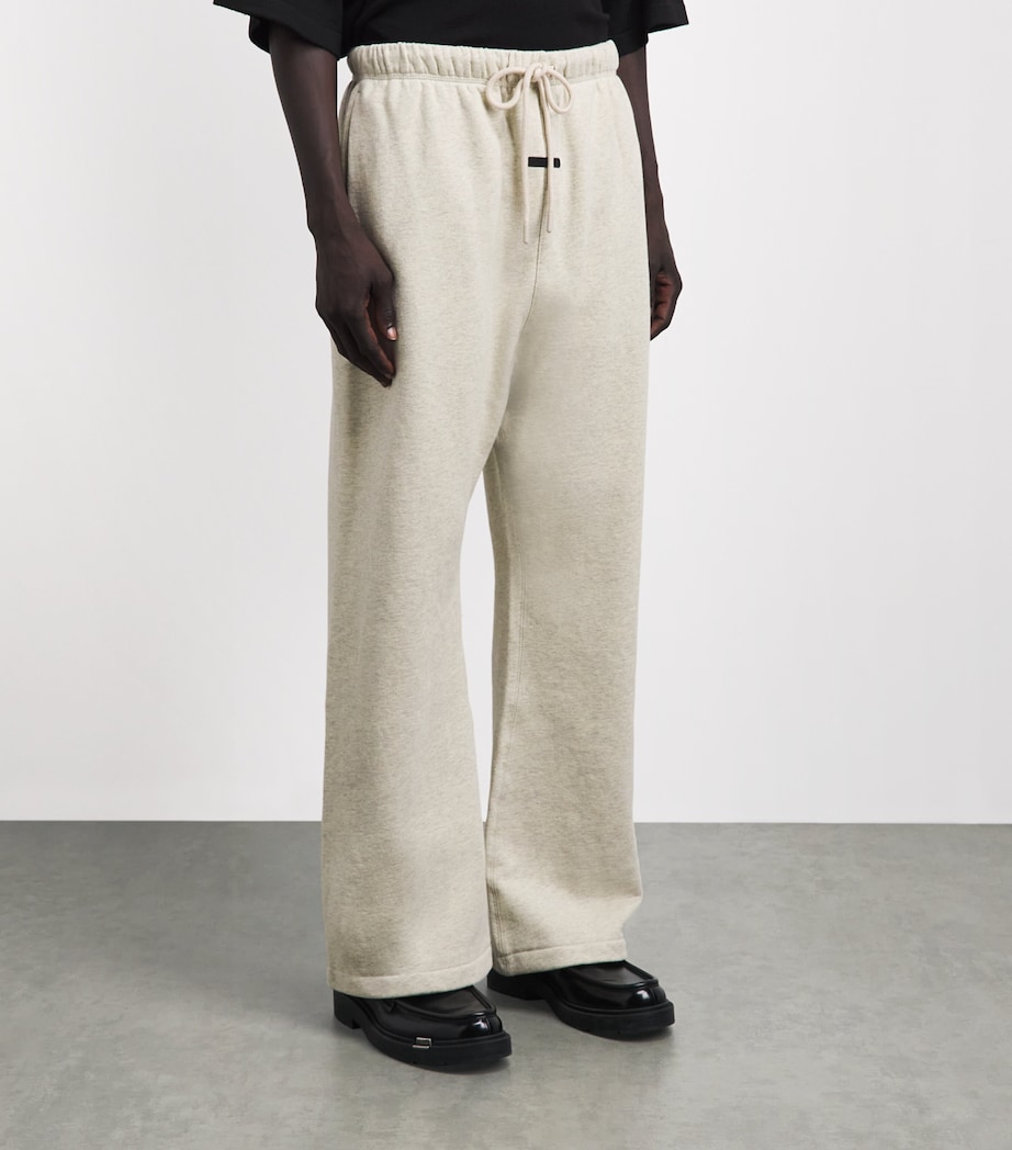 FEAR OF GOD ESSENTIALS Mens Cotton Flared Sweatpants Wshd Vnla Hther Image 4