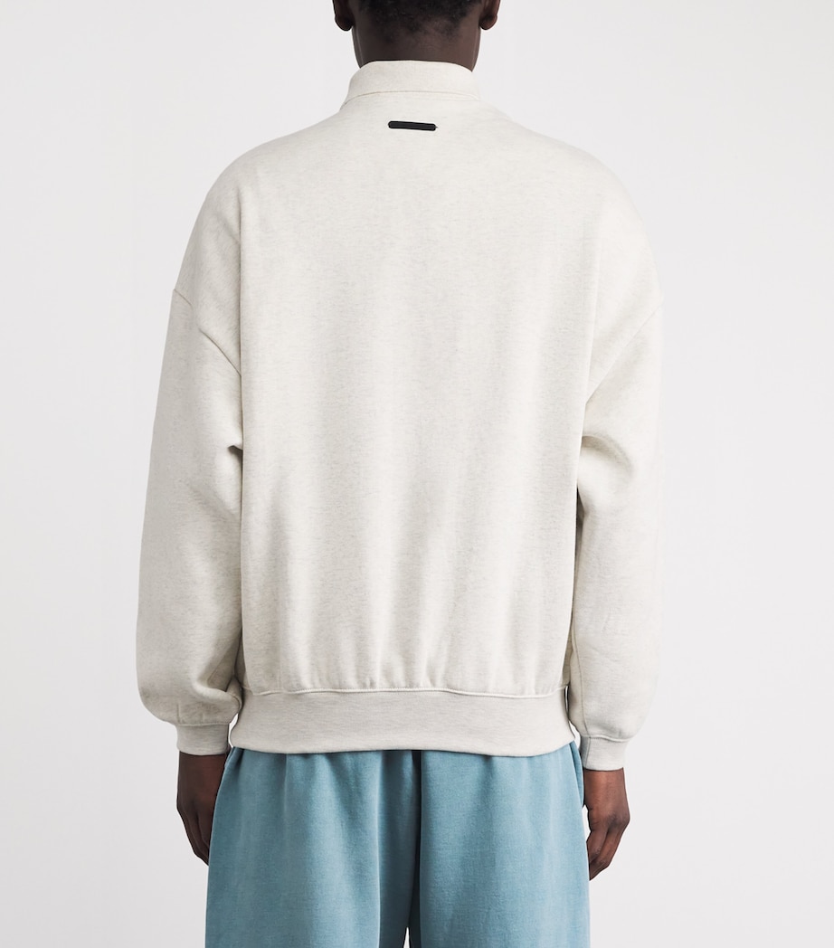 FEAR OF GOD ESSENTIALS Mens Cotton-Blend Logo Polo Sweatshirt Oatml Hthr/lght Hthr Image 5