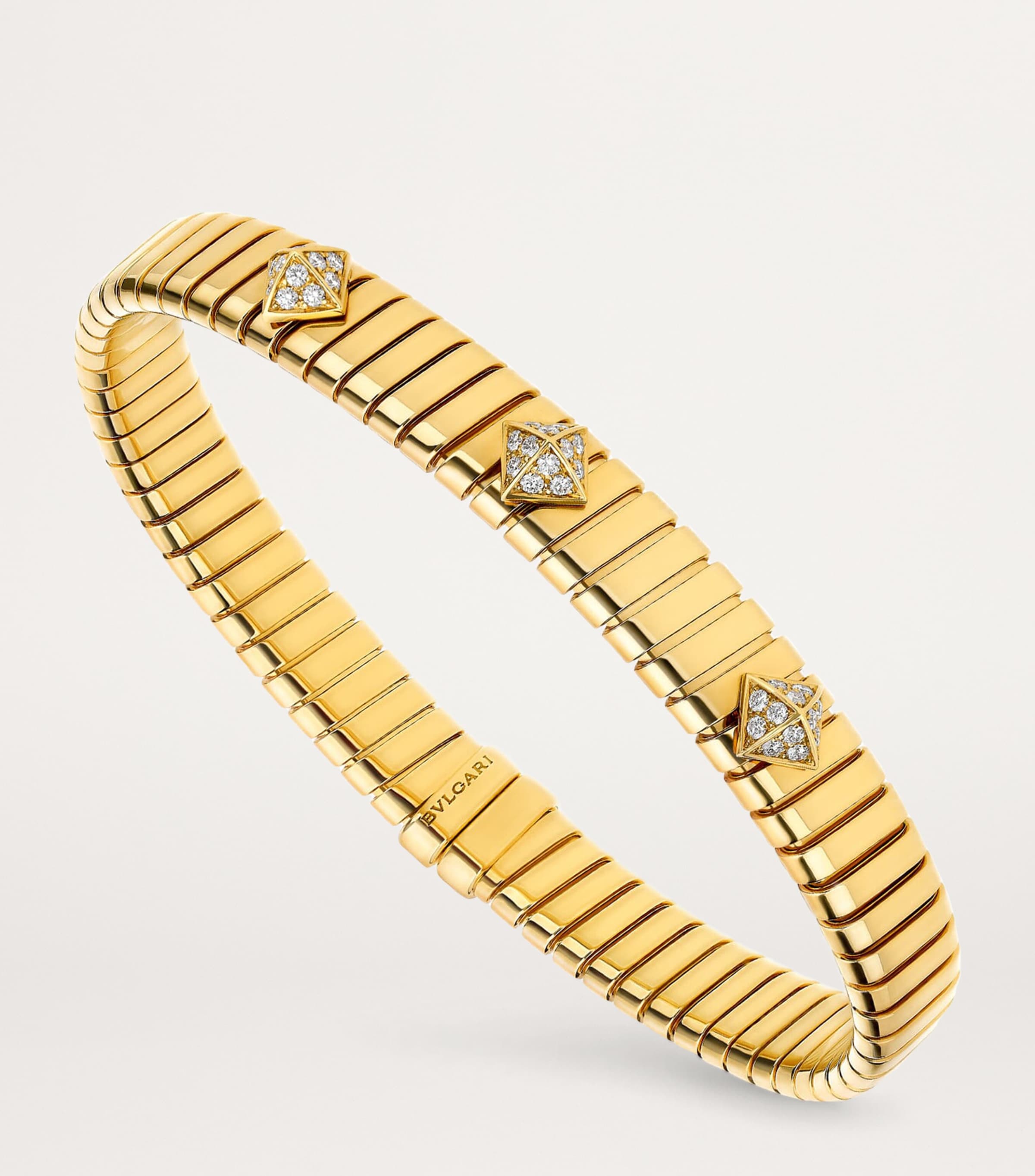 Bvlgari Yellow Gold and Diamond Tubogas Bangle Harrods UK