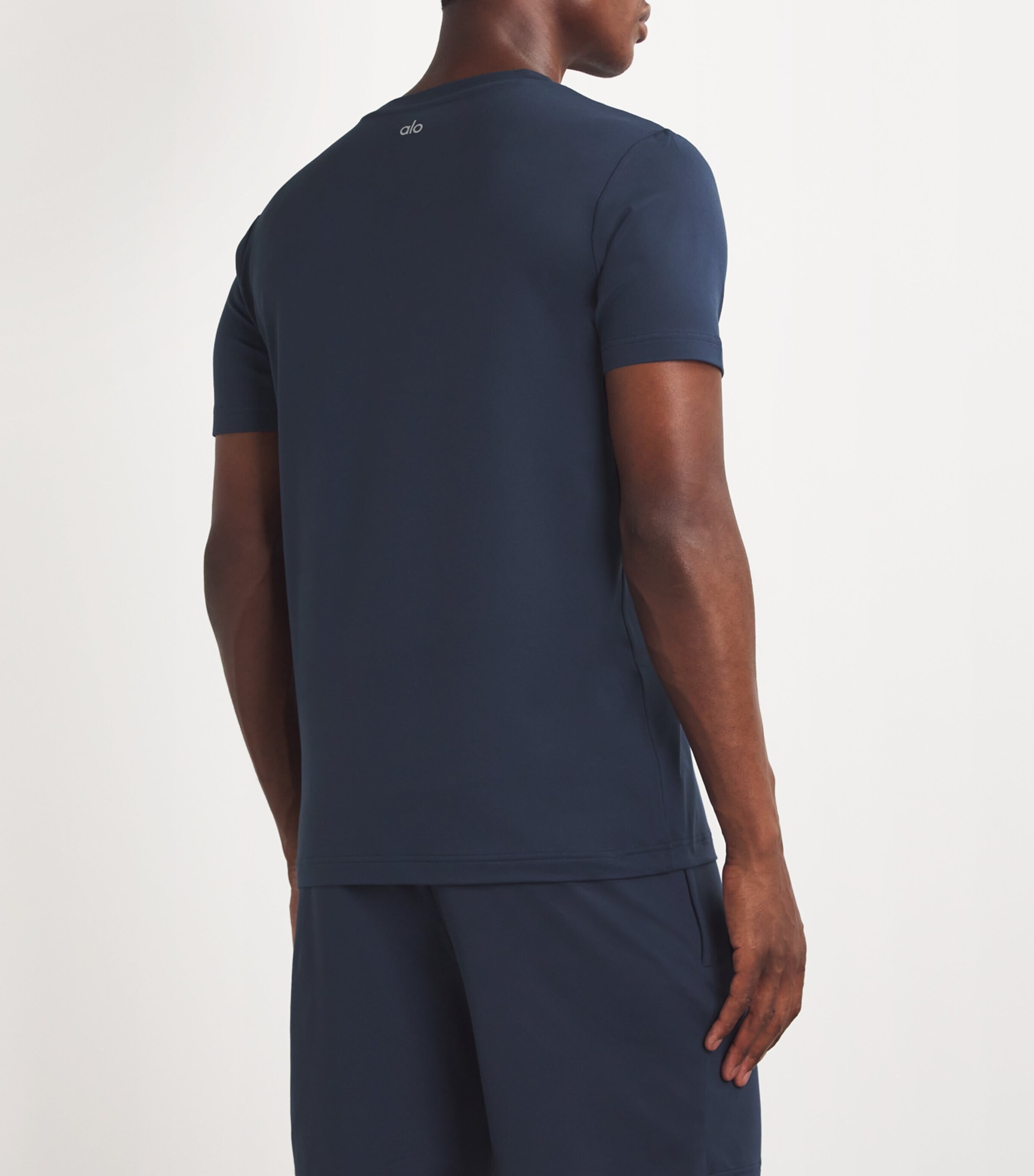Alo Yoga Navy Conquer Reform T-Shirt | Harrods UK
