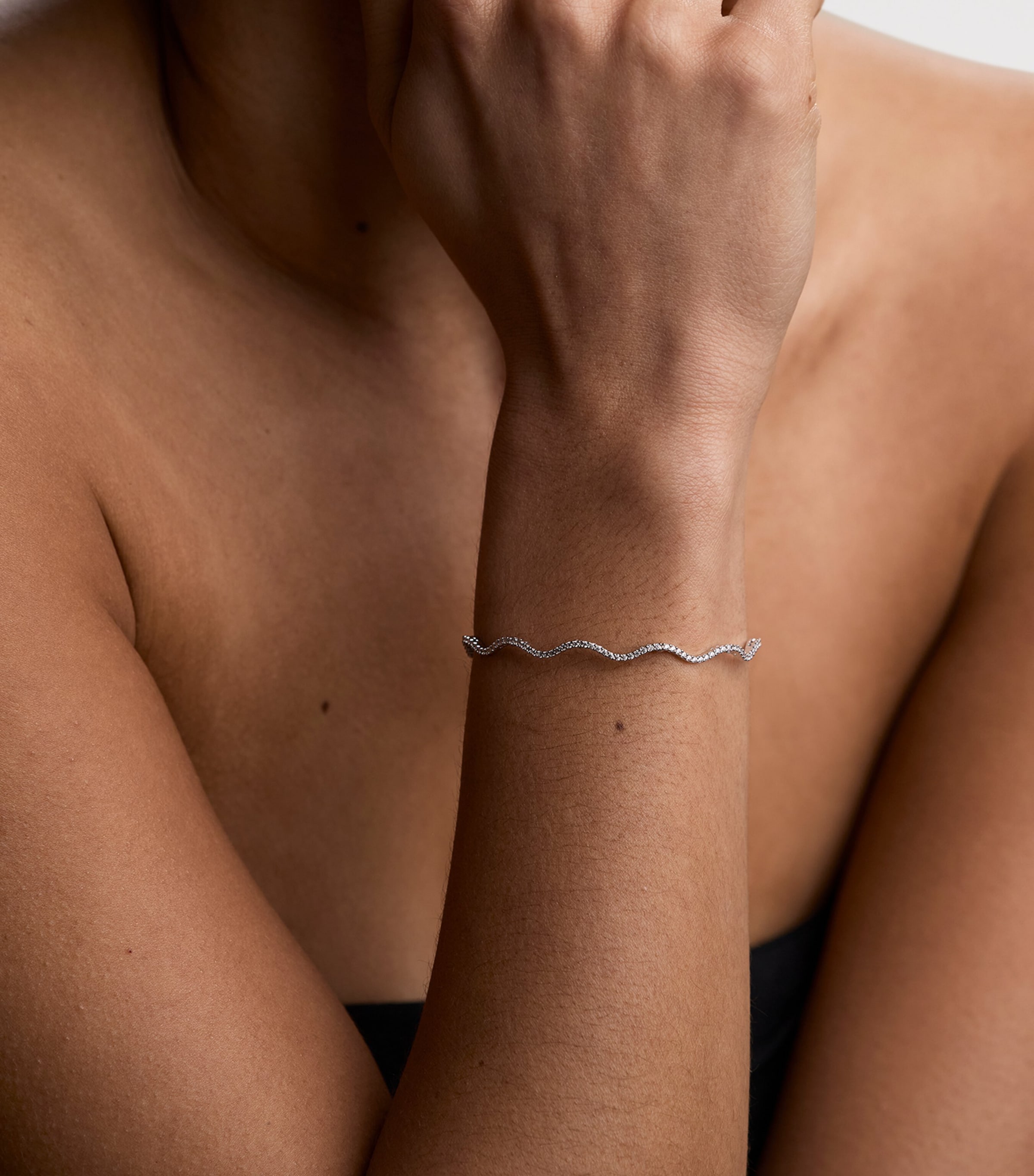 Astrid & Miyu Rhodium-Plated and Cubic Zirconia Ripple Tennis Bracelet Silver Image 2