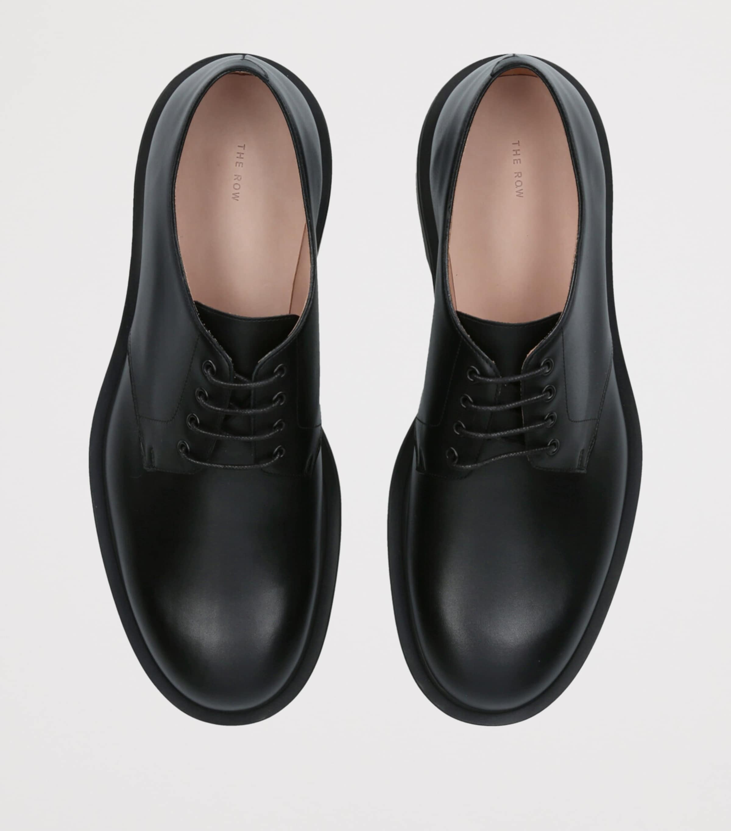 The Row Black Nic Leather Derby Shoes | Harrods US