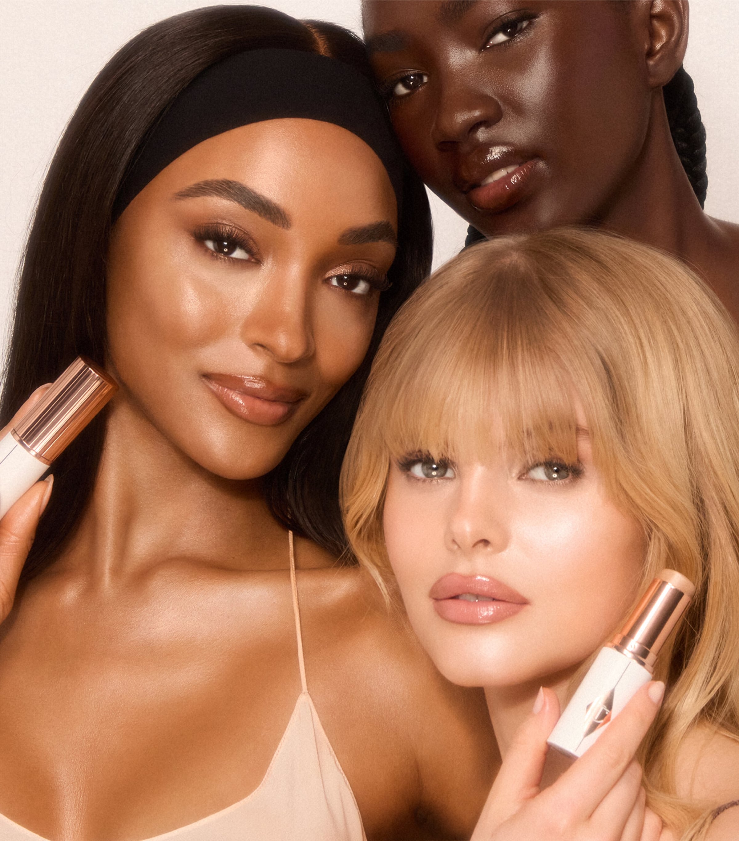 Charlotte Tilbury Unreal Skin Sheer Glow Tint Tan Image 2