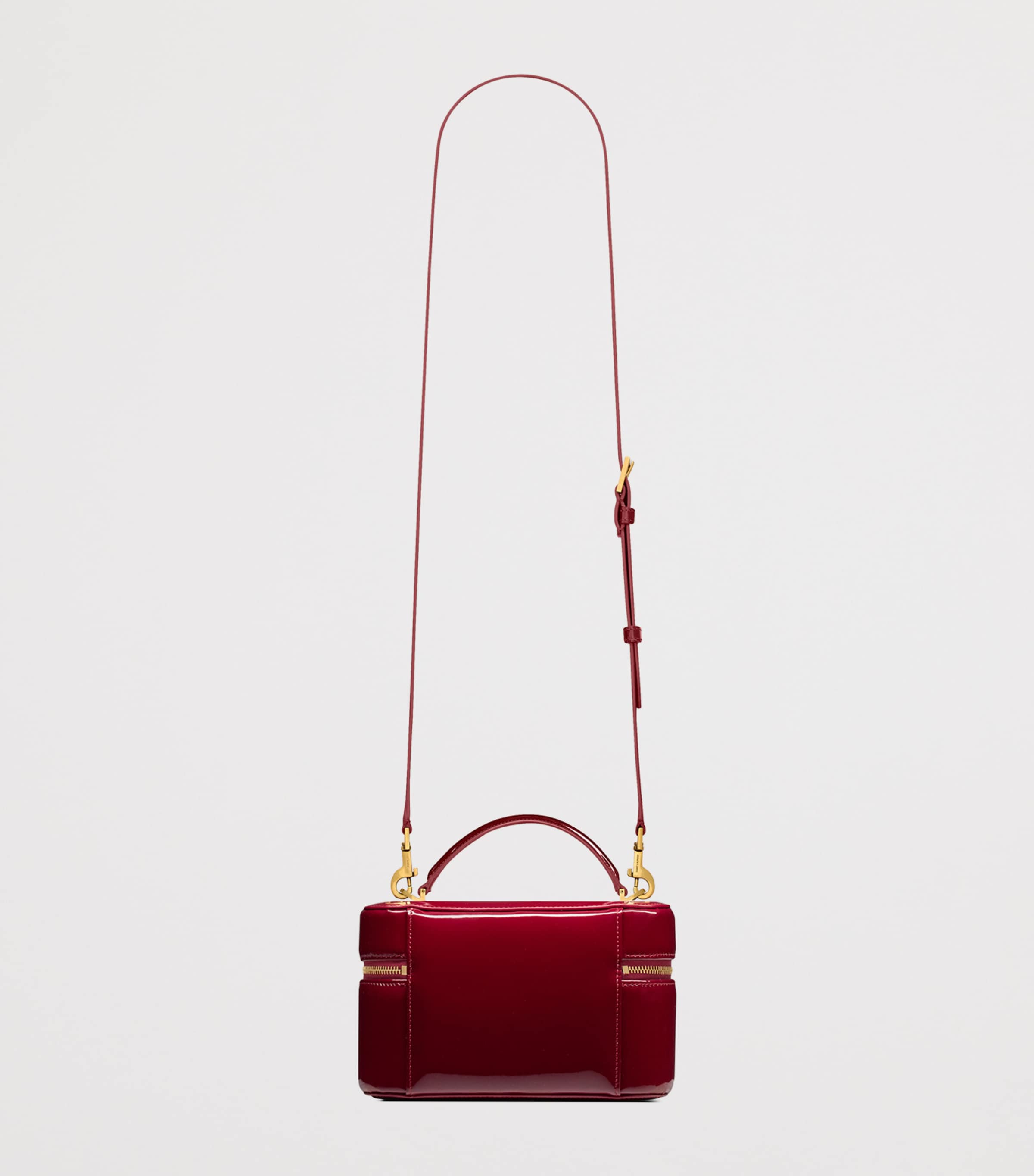 Saint Laurent Pink Patent Leather Gaby Vanity Bag | Harrods US