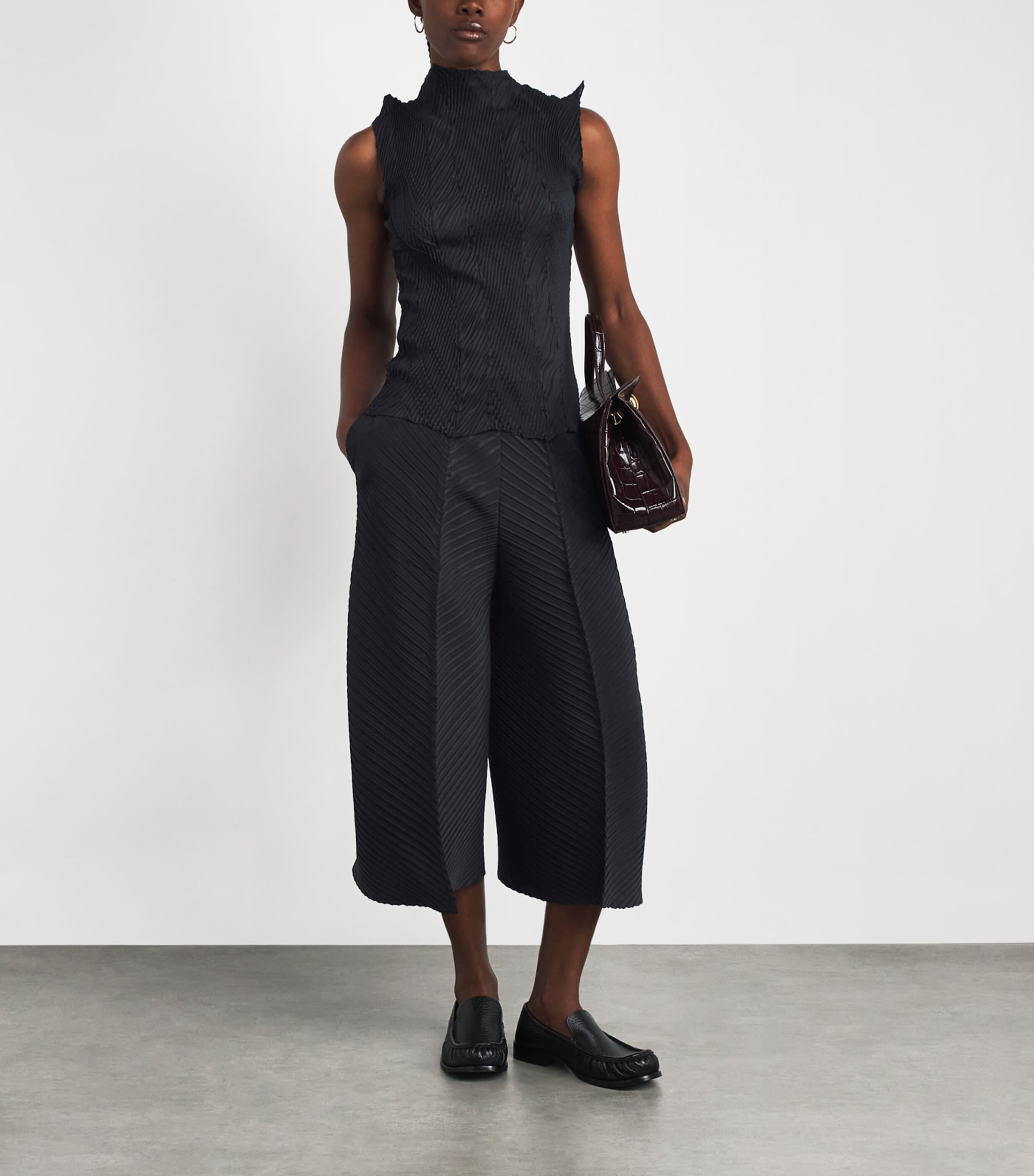 Issey Miyake Black Zigzag Pleats Sleeveless Top | Harrods US
