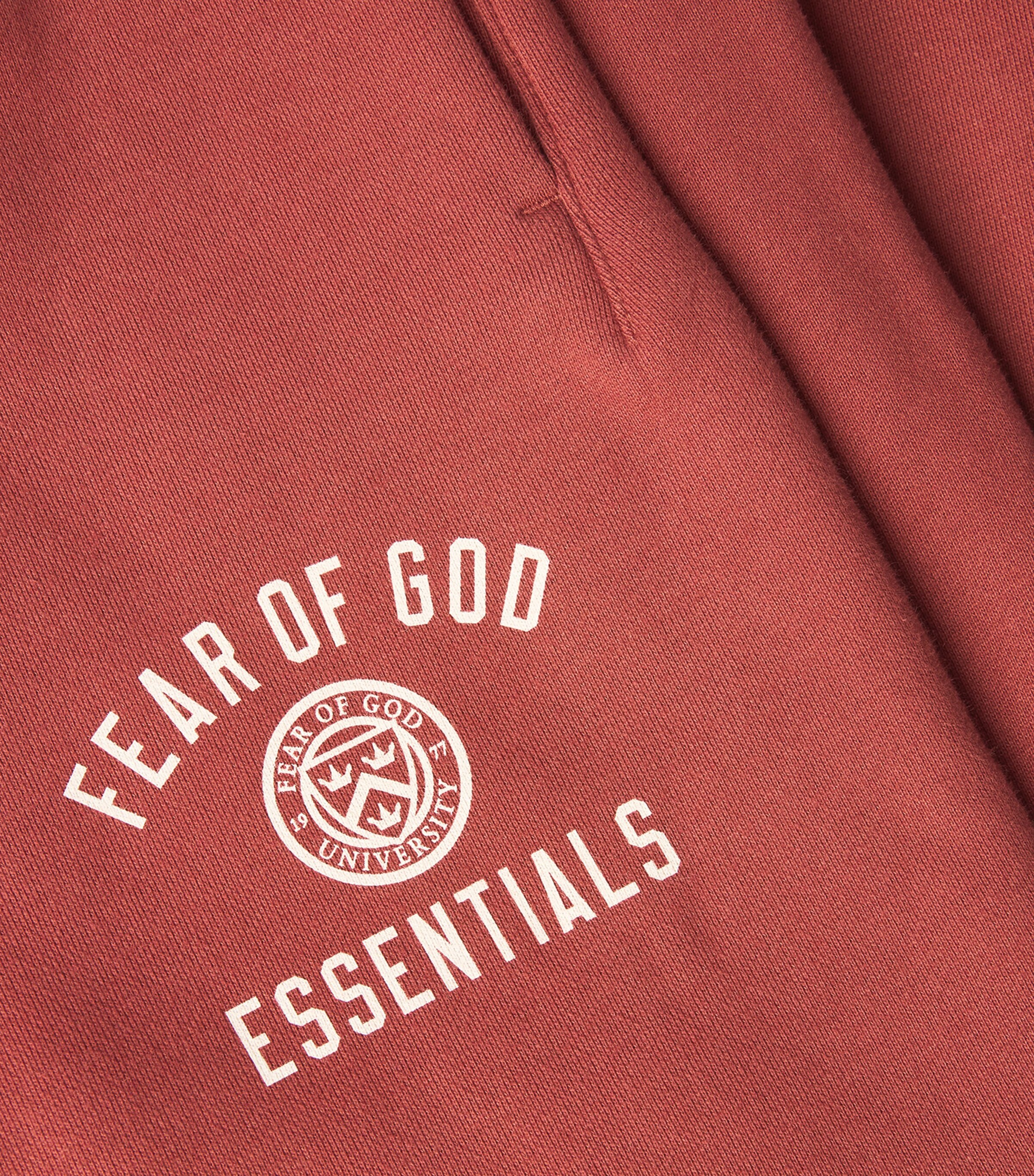 FEAR OF GOD ESSENTIALS Mens University Crest Logo Open-Cuff Sweatpants Crimson Image 4