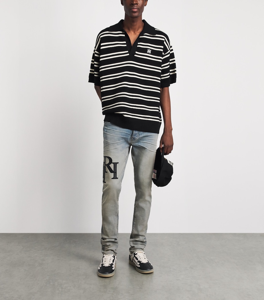 AMIRI Mens Staggered Logo Skinny Jeans Antique Indigo Black Image 2