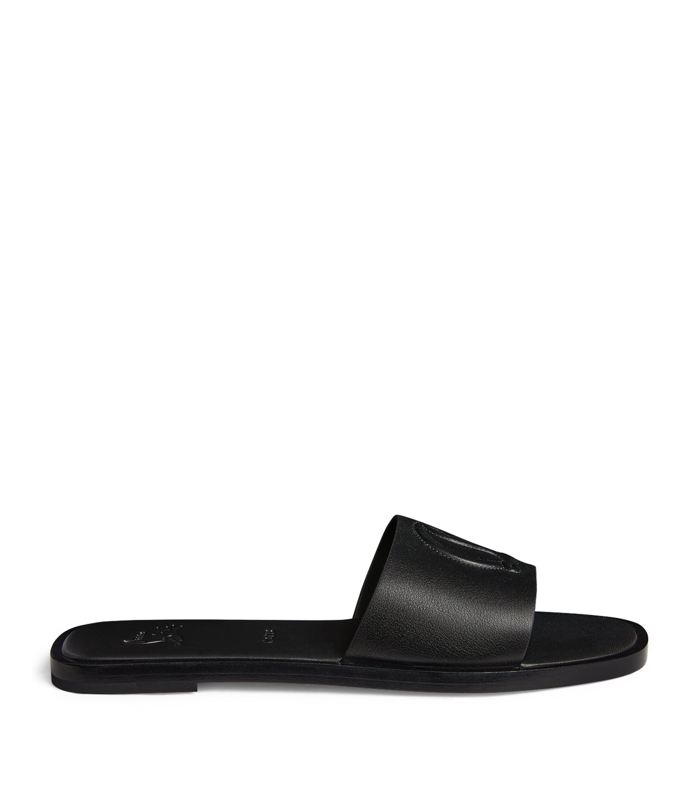 Shop Christian Louboutin Cl Mule Leather Flat Sandals In Black