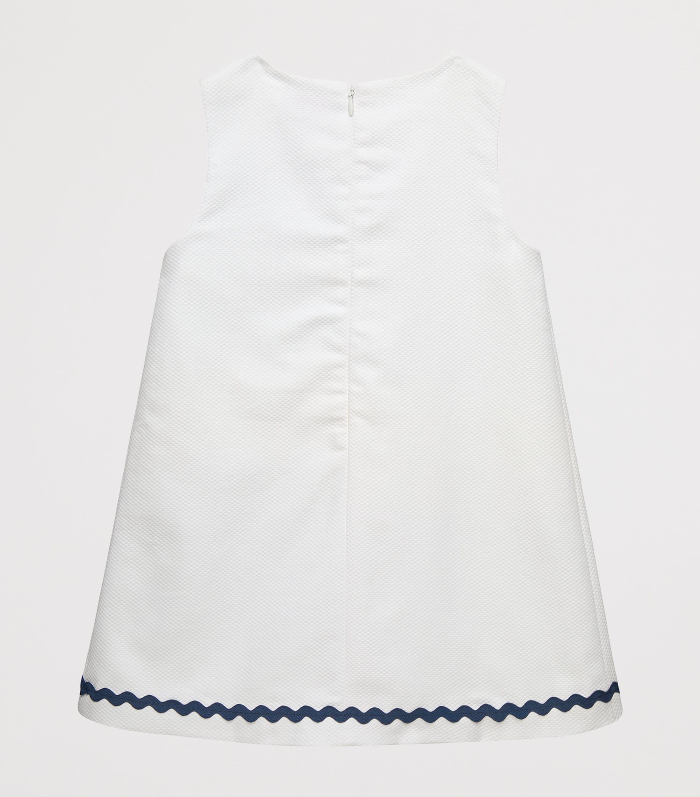 Trotters Cotton Piqué Mia Dress (6-11 Years) White/navy Image 2