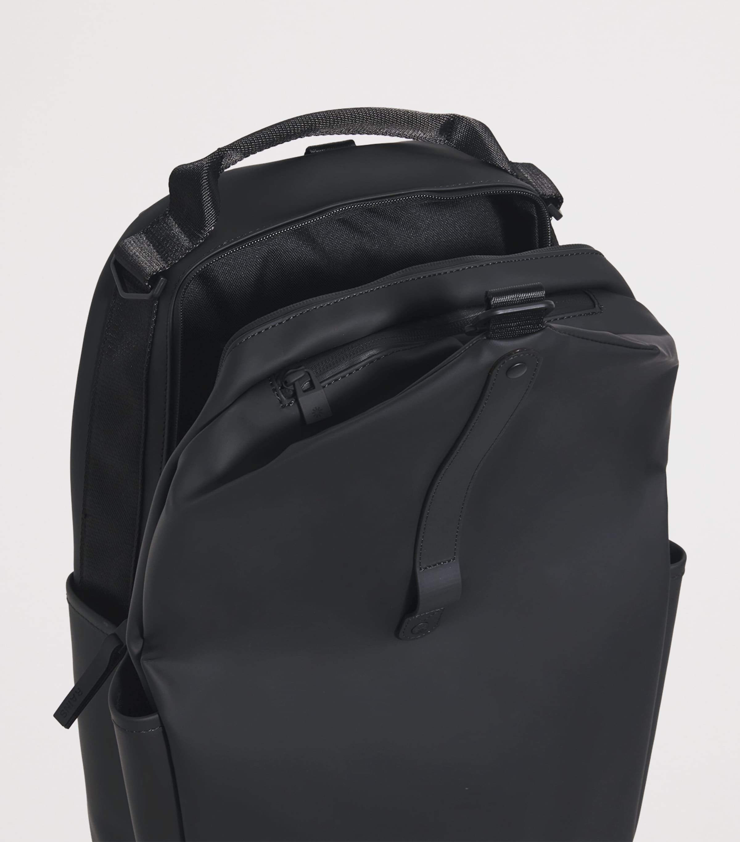 Rains Black Waterproof Clip Front Backpack | Harrods US