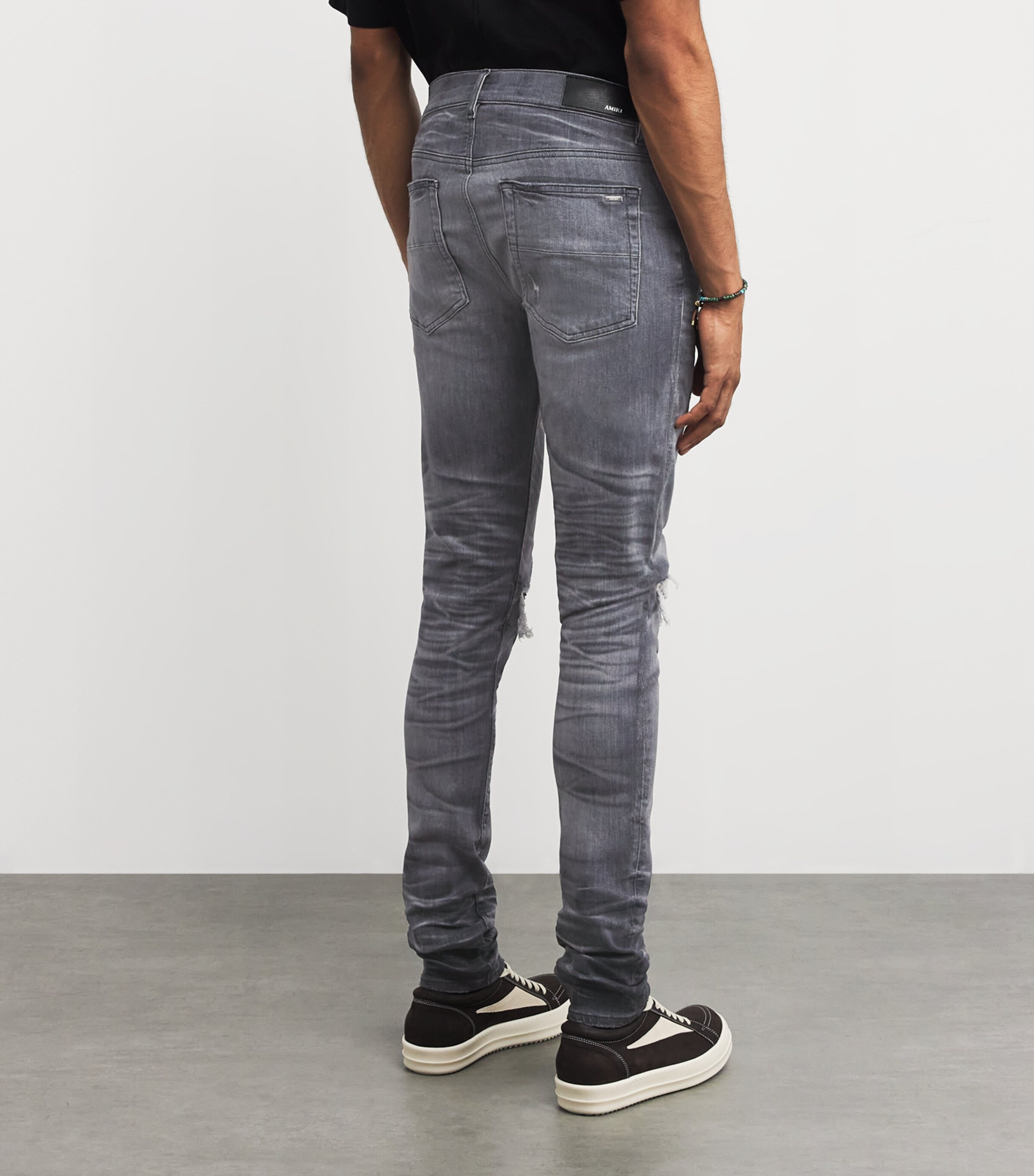 AMIRI Grey Suede-Trim Distressed MX1 Jeans | Harrods TW