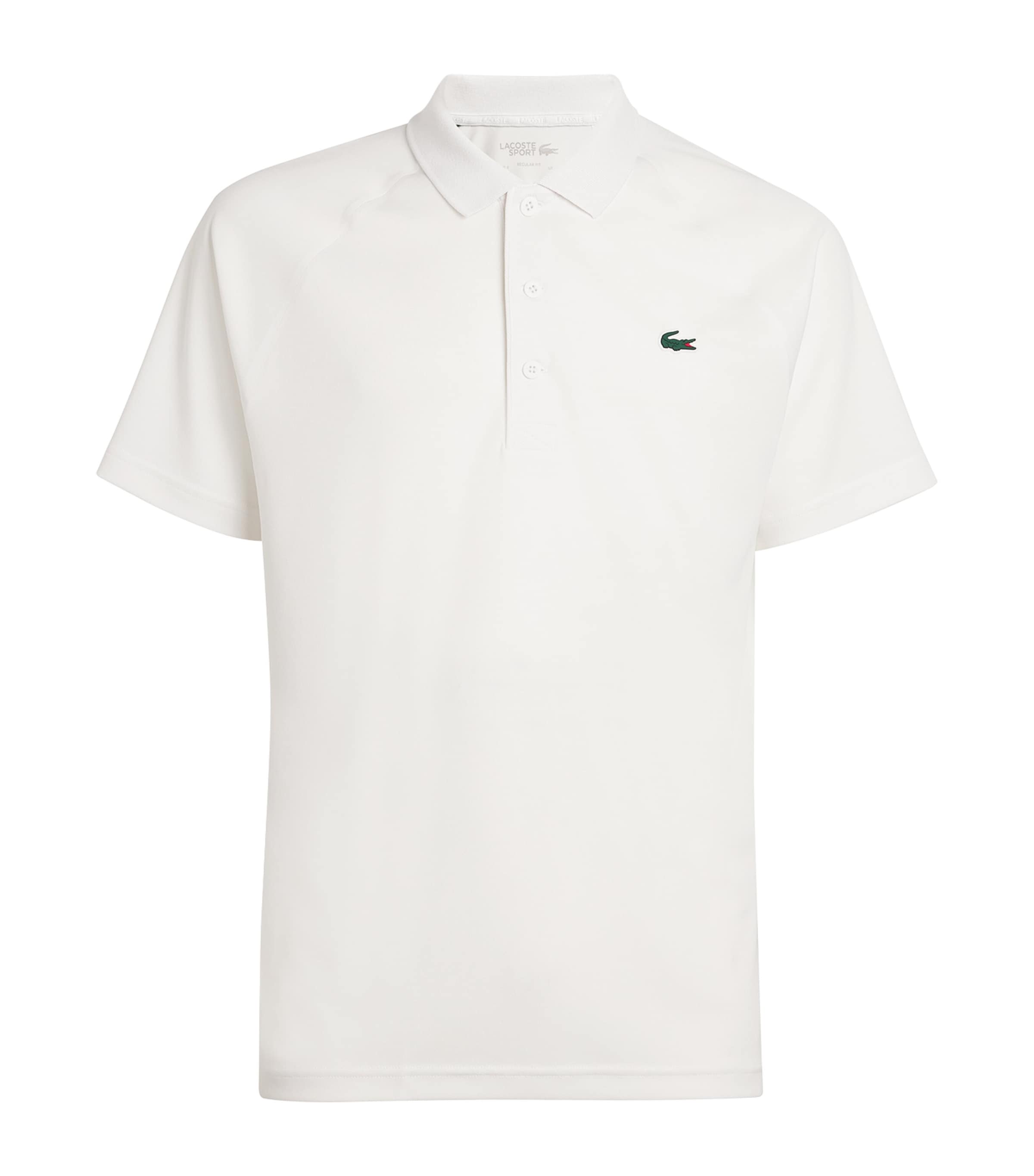 Shop Lacoste Core Performance Polo Shirt In White