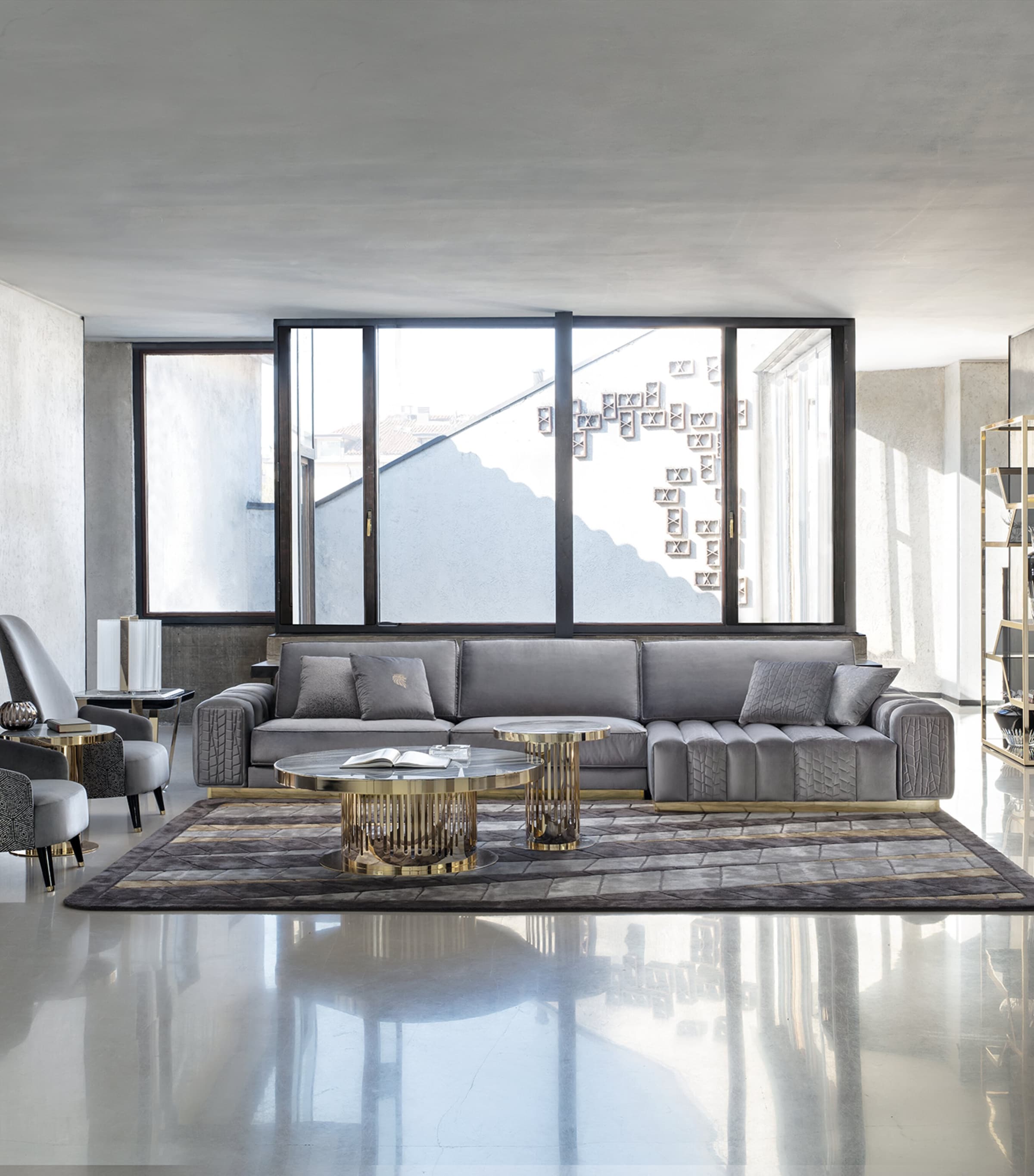 Wide shot of large grey sofa in modern living space