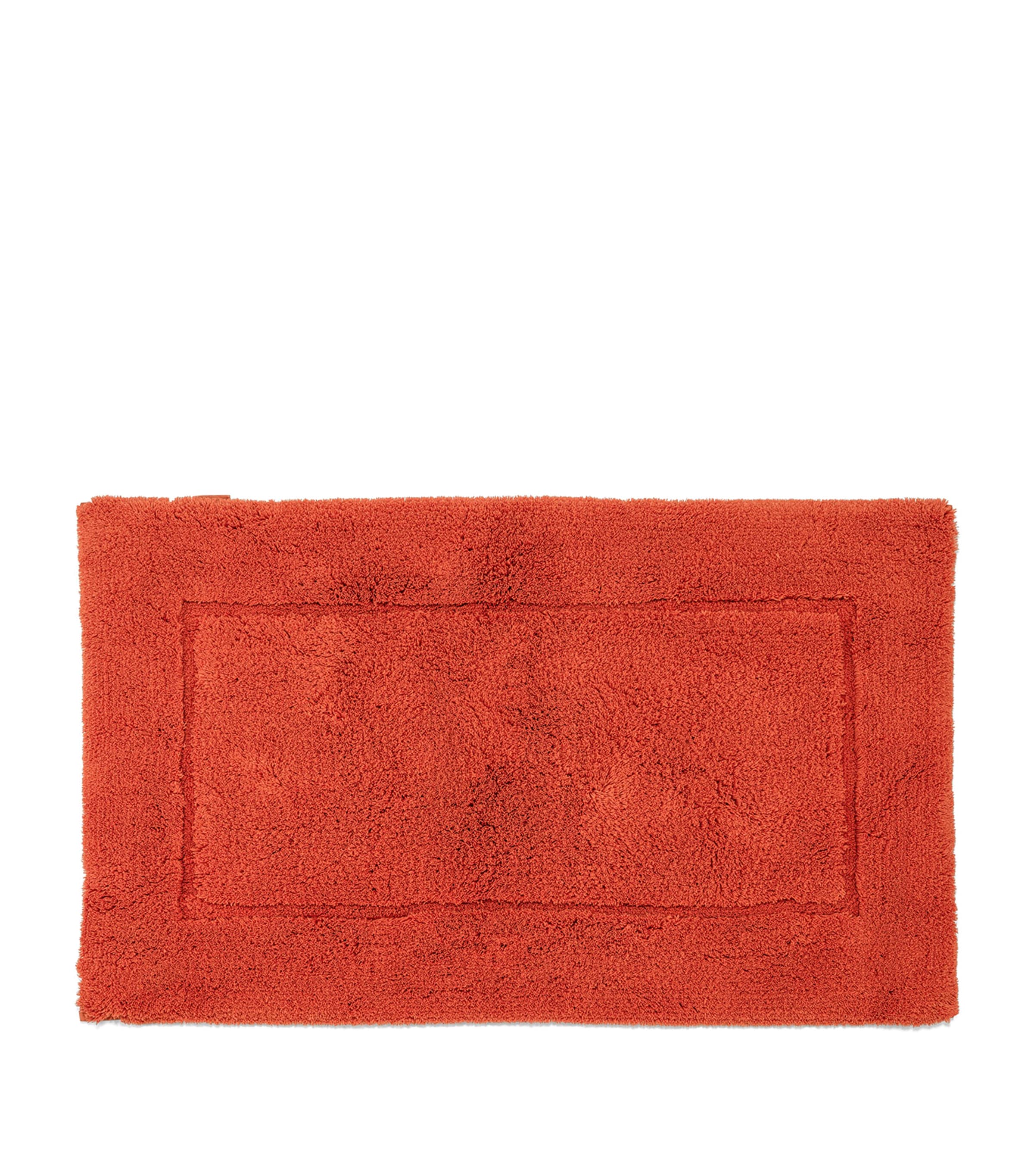 Shop Abyss & Habidecor Egyptian Cotton Must Bath Mat In Red