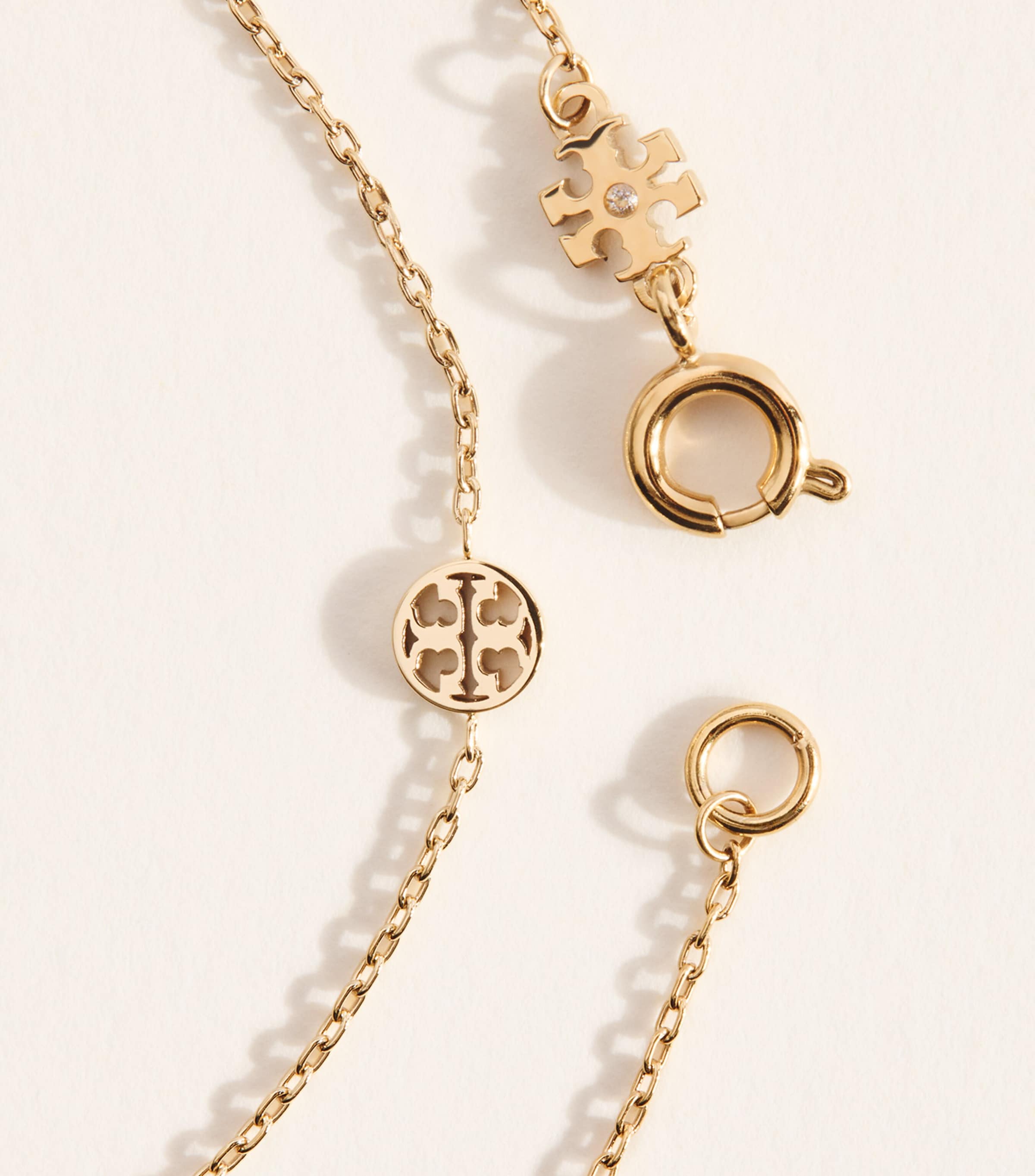 Tory Burch Gold-Plated Icon Necklace | Harrods US