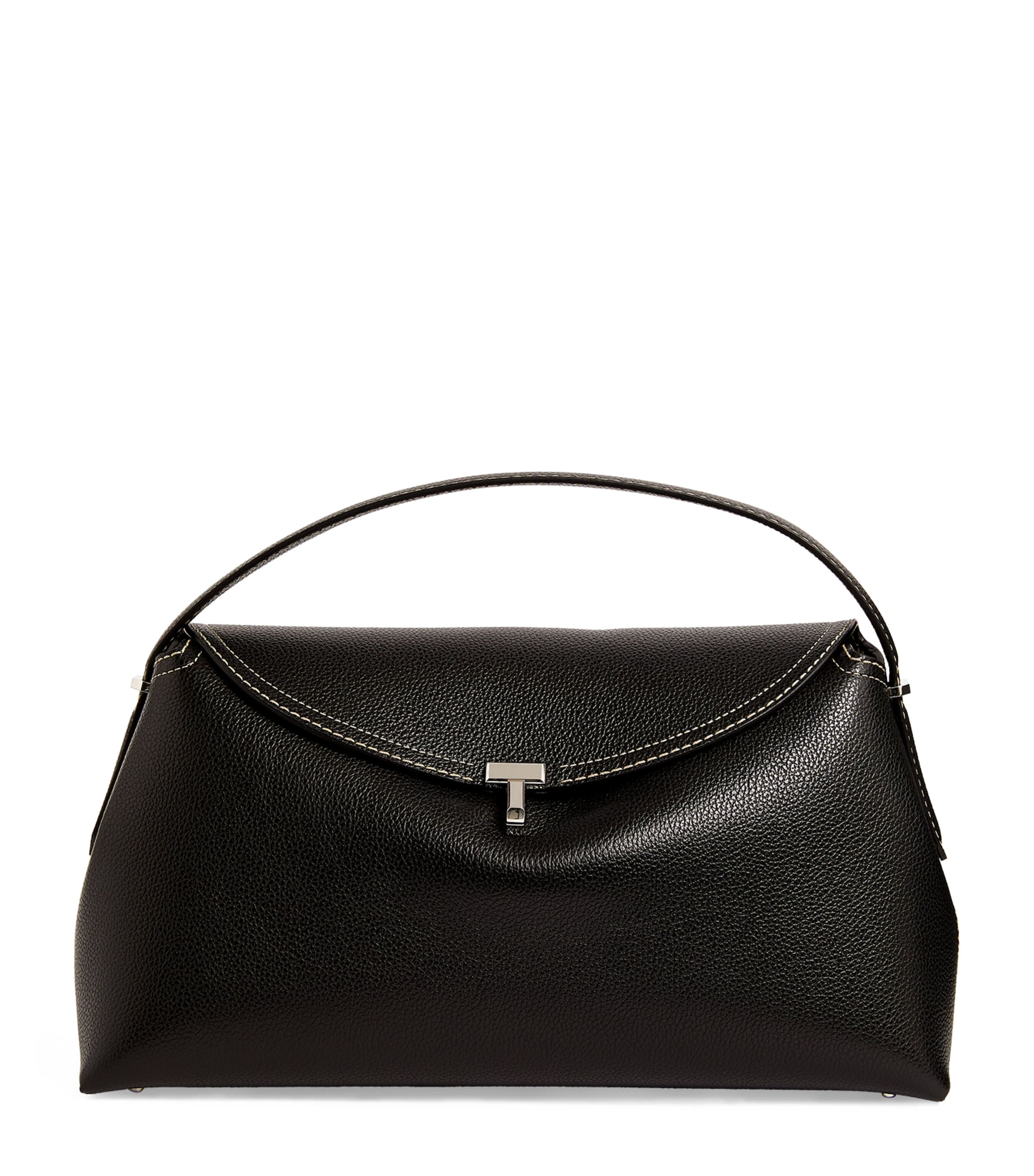 Shop Totême Leather T-lock Top-handle Bag In Black