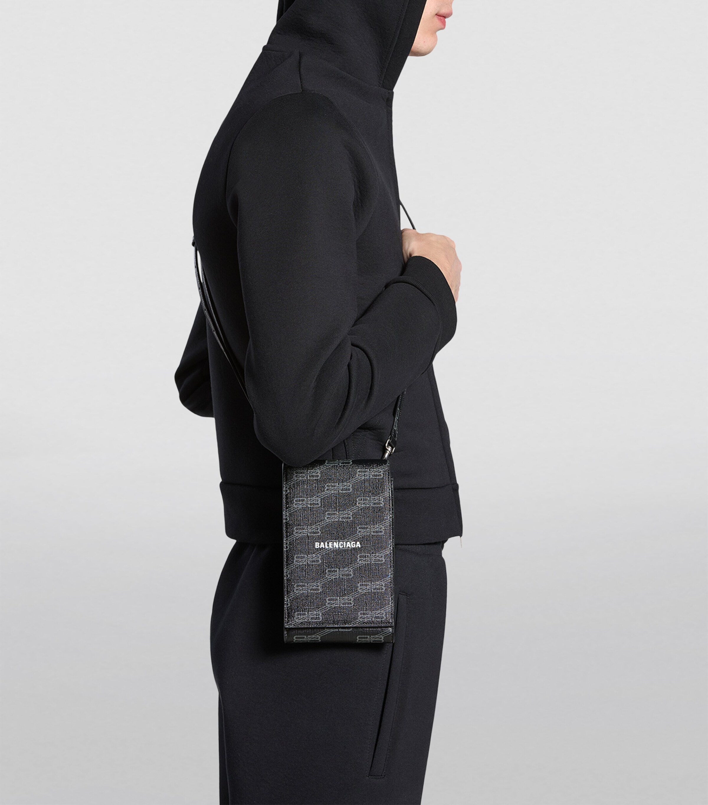 BALENCIAGA バレンシアガ PHONE HOLDER Balenciaga Black Signature Monogram Phone Holder | Harrods UK
