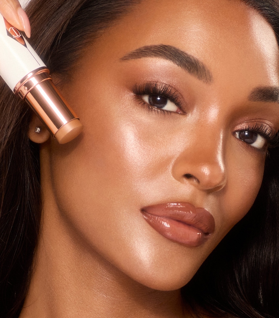 Unreal Skin Sheer Glow Tint 10 TAN Image 2