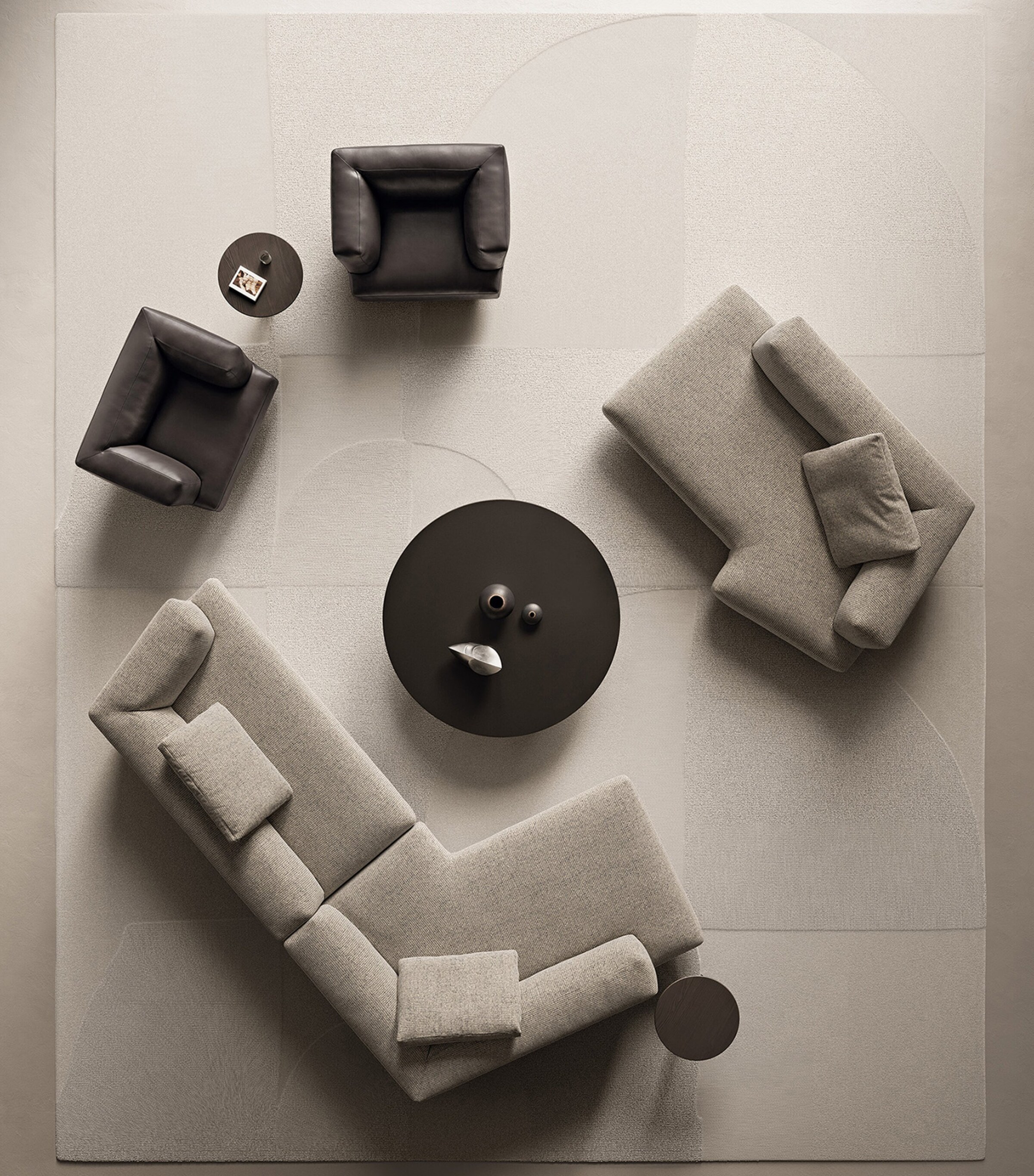 Top-down layout of multiple grey and dark chairs around a circular table