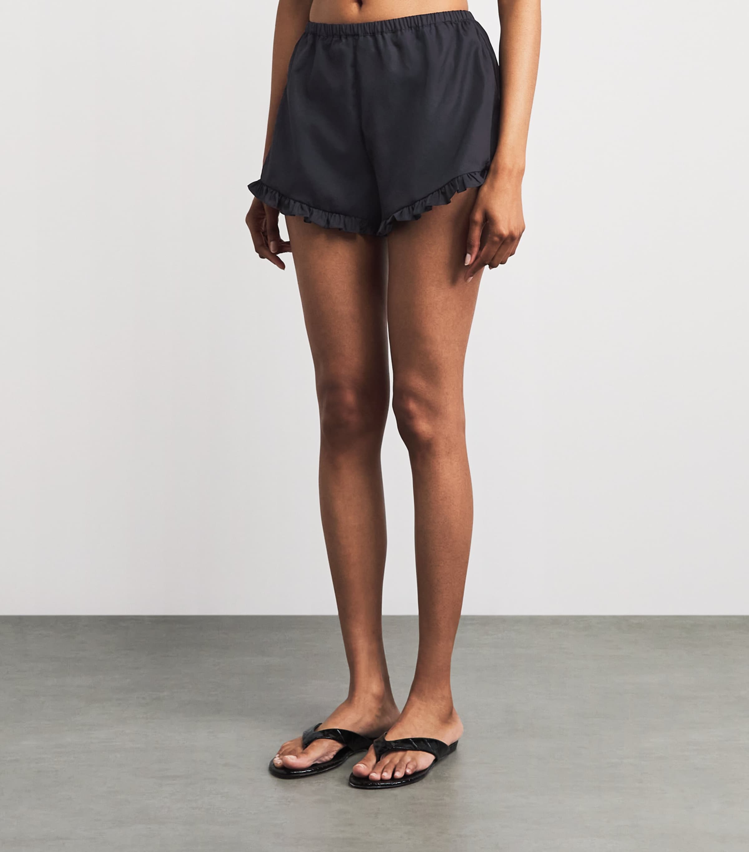 Hunza G Black Cotton Frill Shorts | Harrods UK