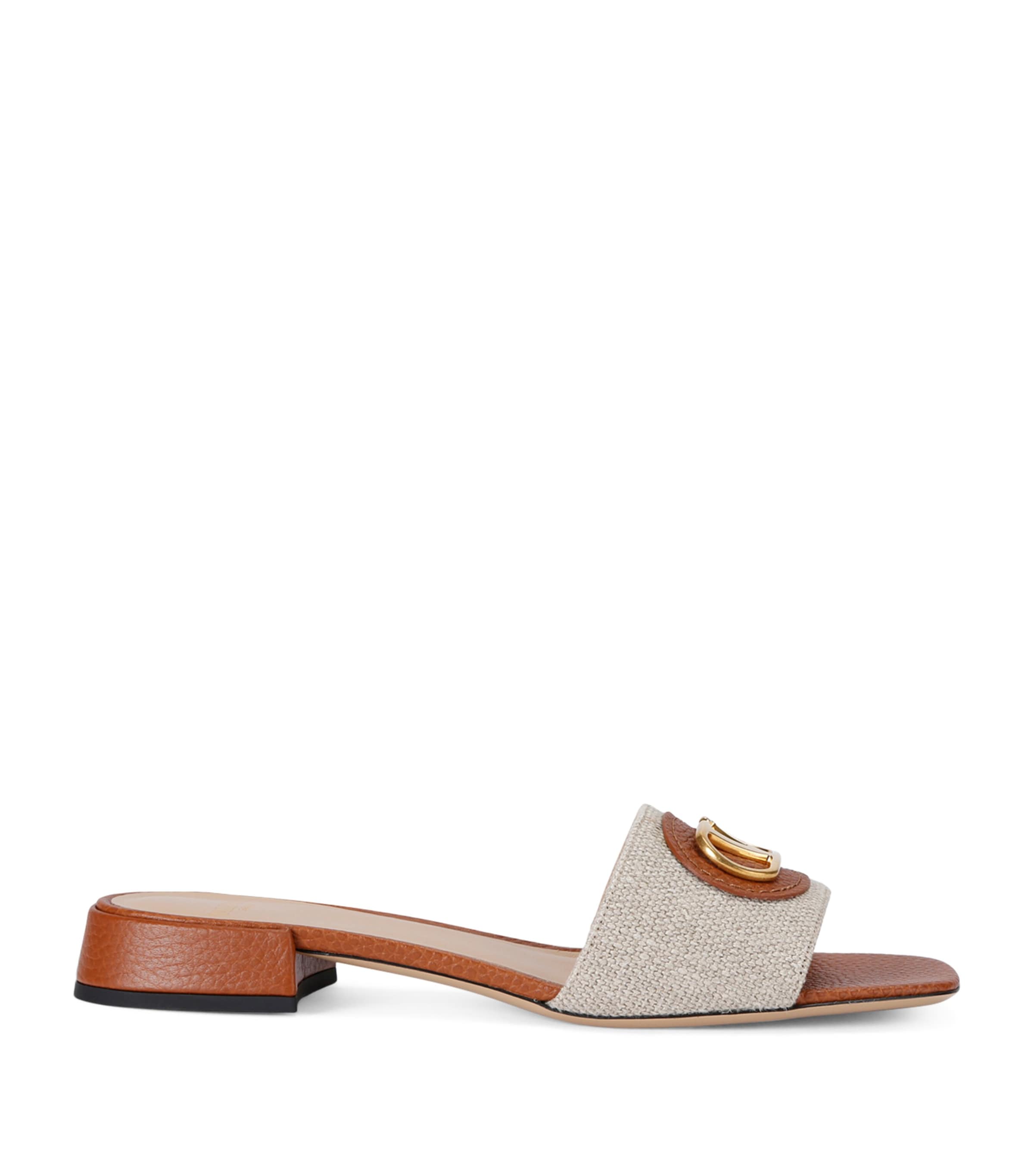 Valentino Garavani Leather VLOGO Slides 20 | Holiday Shop | Women Shoes | Sandals | Sliders | Designers | Valentino Garavani | Men Clothing | Knitwear | Cardigans | Women Clothing | Skirts | Mini Skirts | Boots | Biker Boots | 5259