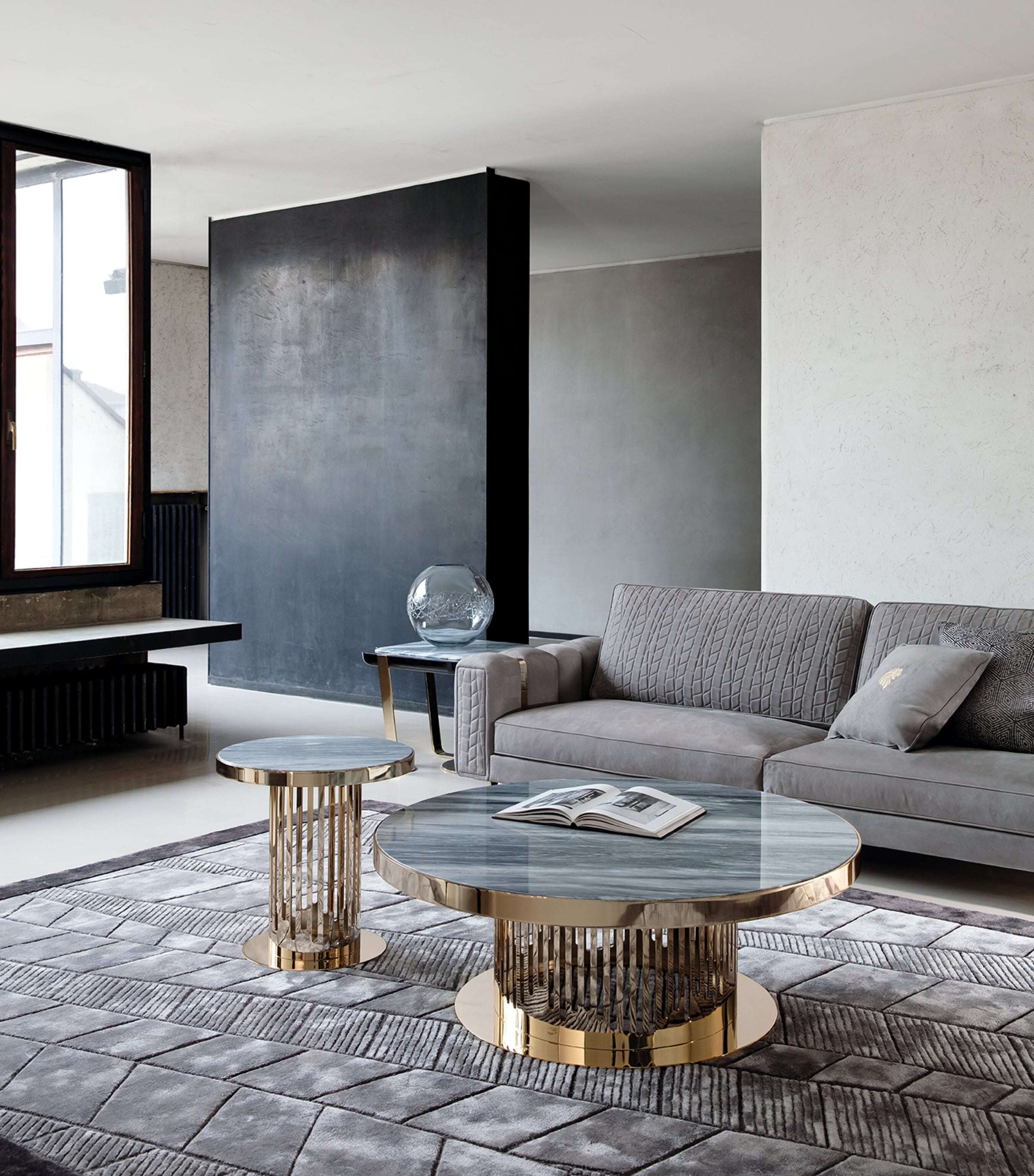 Sofa with side table and coffee table in living area