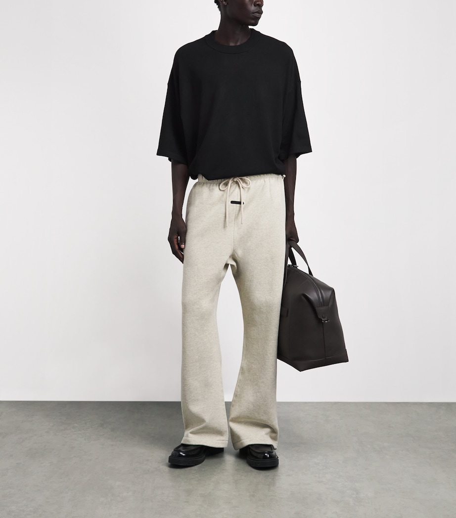 FEAR OF GOD ESSENTIALS Mens Cotton Flared Sweatpants Wshd Vnla Hther Image 2