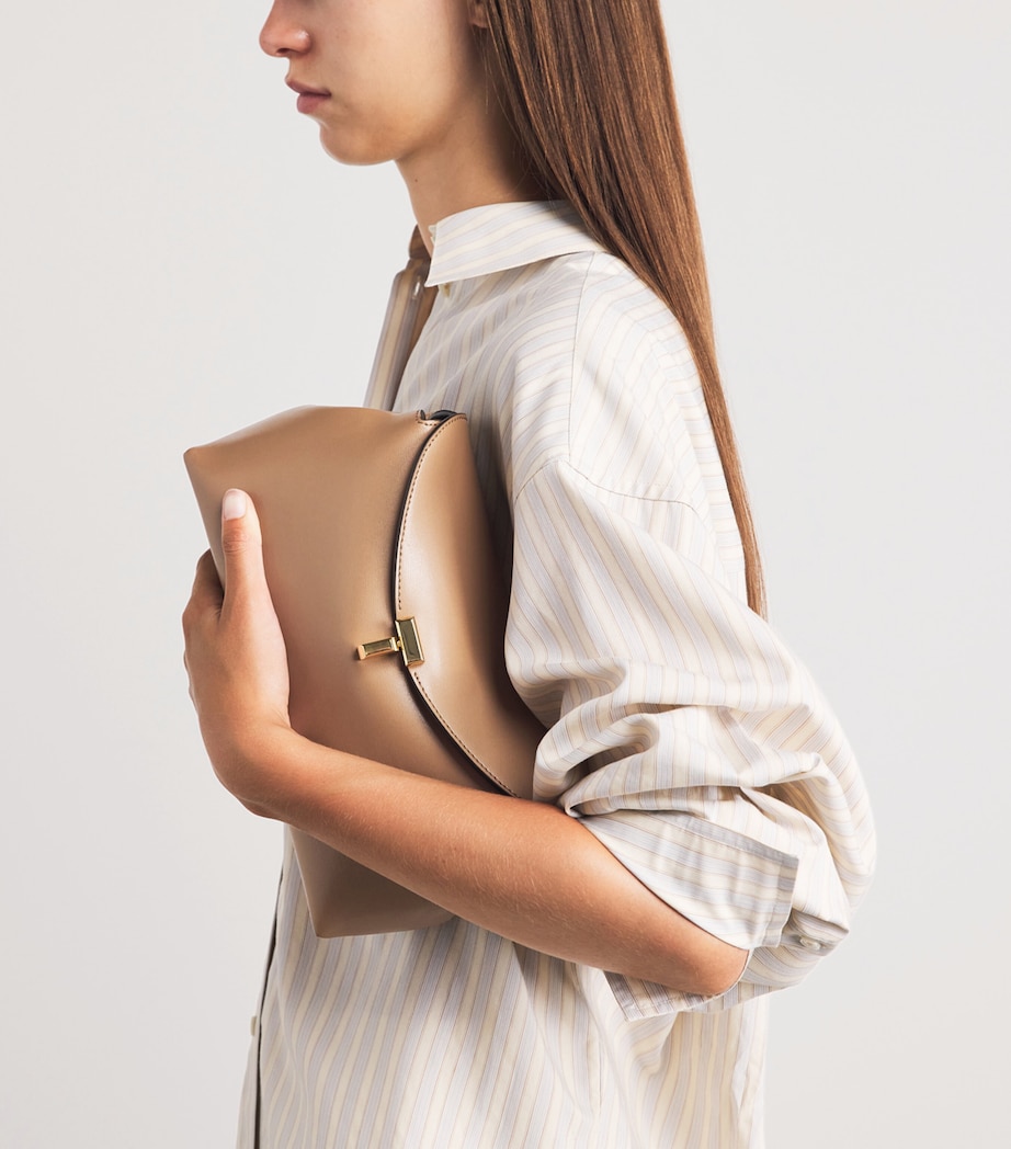 Toteme Leather T-Lock Clutch Bag Camel Image 2