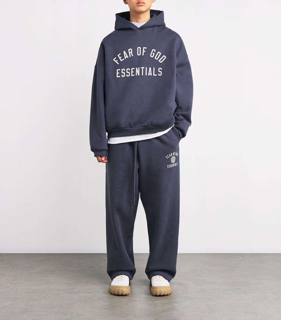 FEAR OF GOD ESSENTIALS Mens Cotton-Blend Logo Print Hoodie Marine Image 2