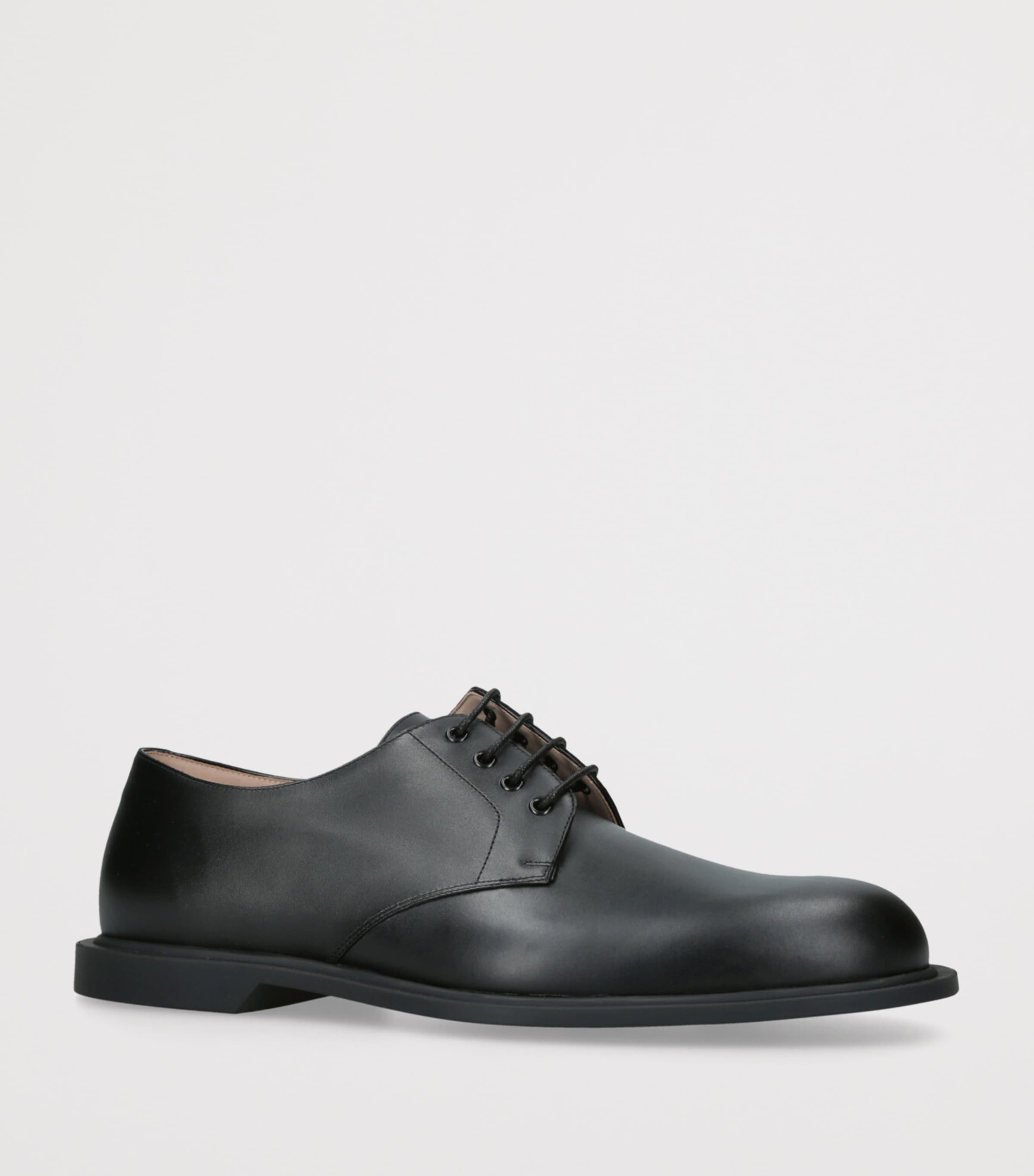 The Row Black Nic Leather Derby Shoes | Harrods US