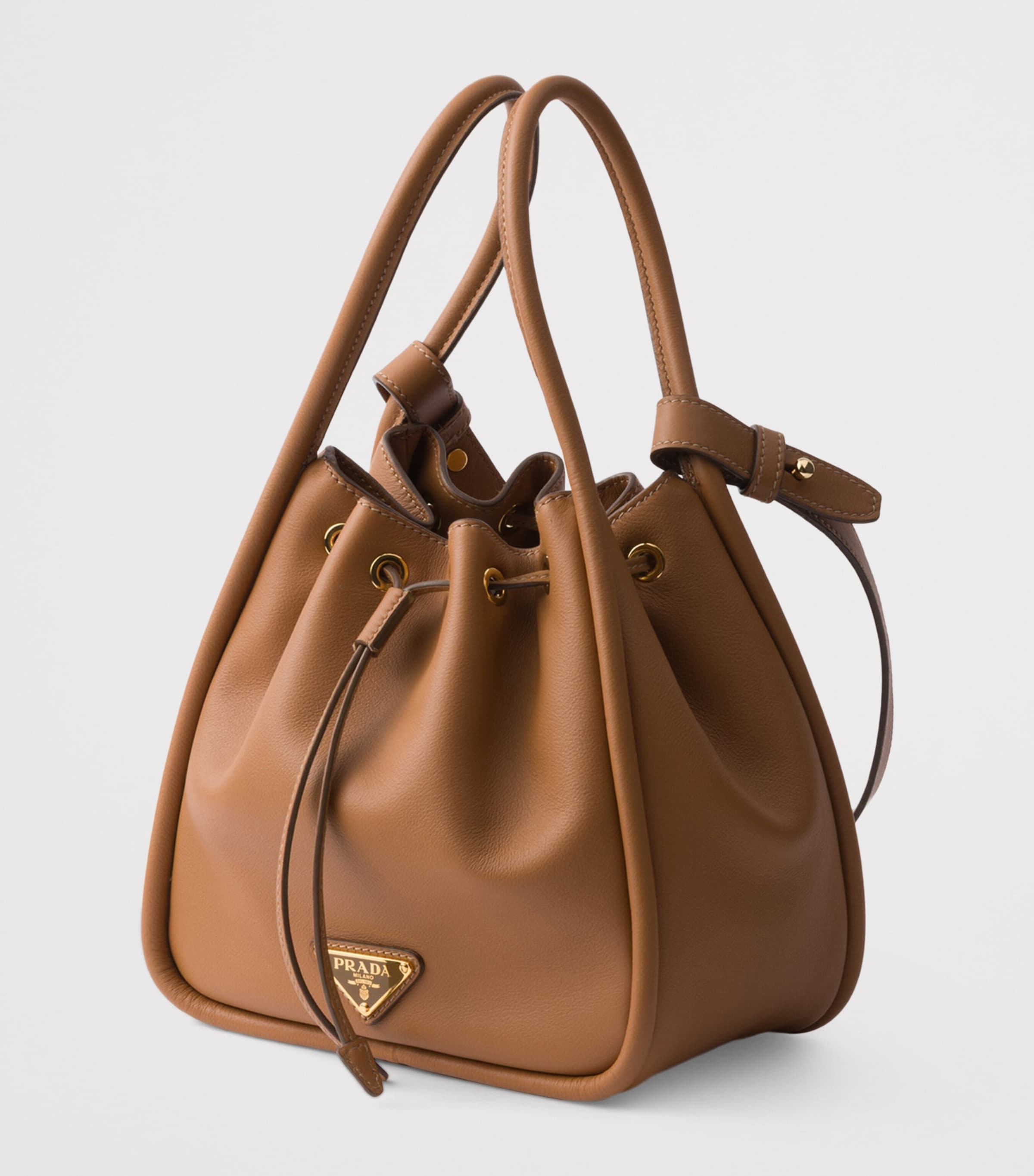 Prada Mini Leather Darling Bucket Bag | Harrods UK