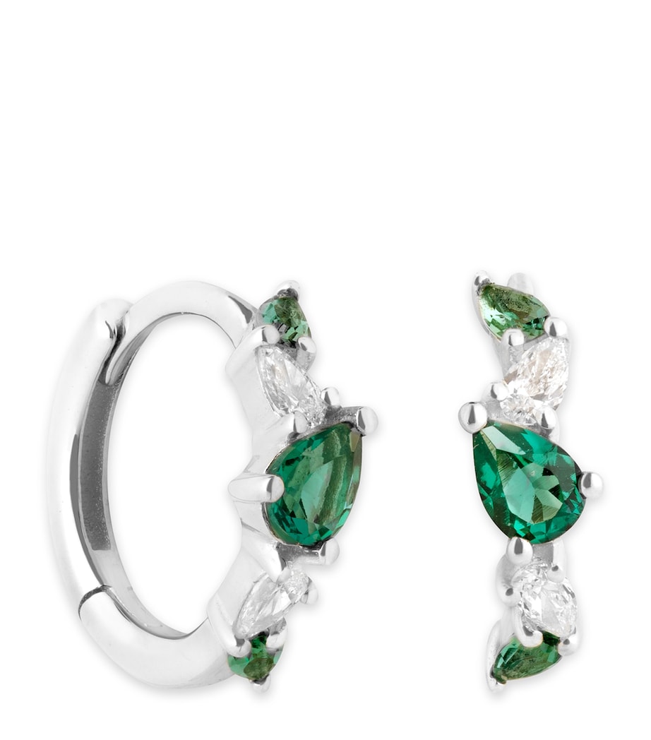 Astrid & Miyu White Gold, Diamond and Emerald Huggie Hoops White Gold Image 1