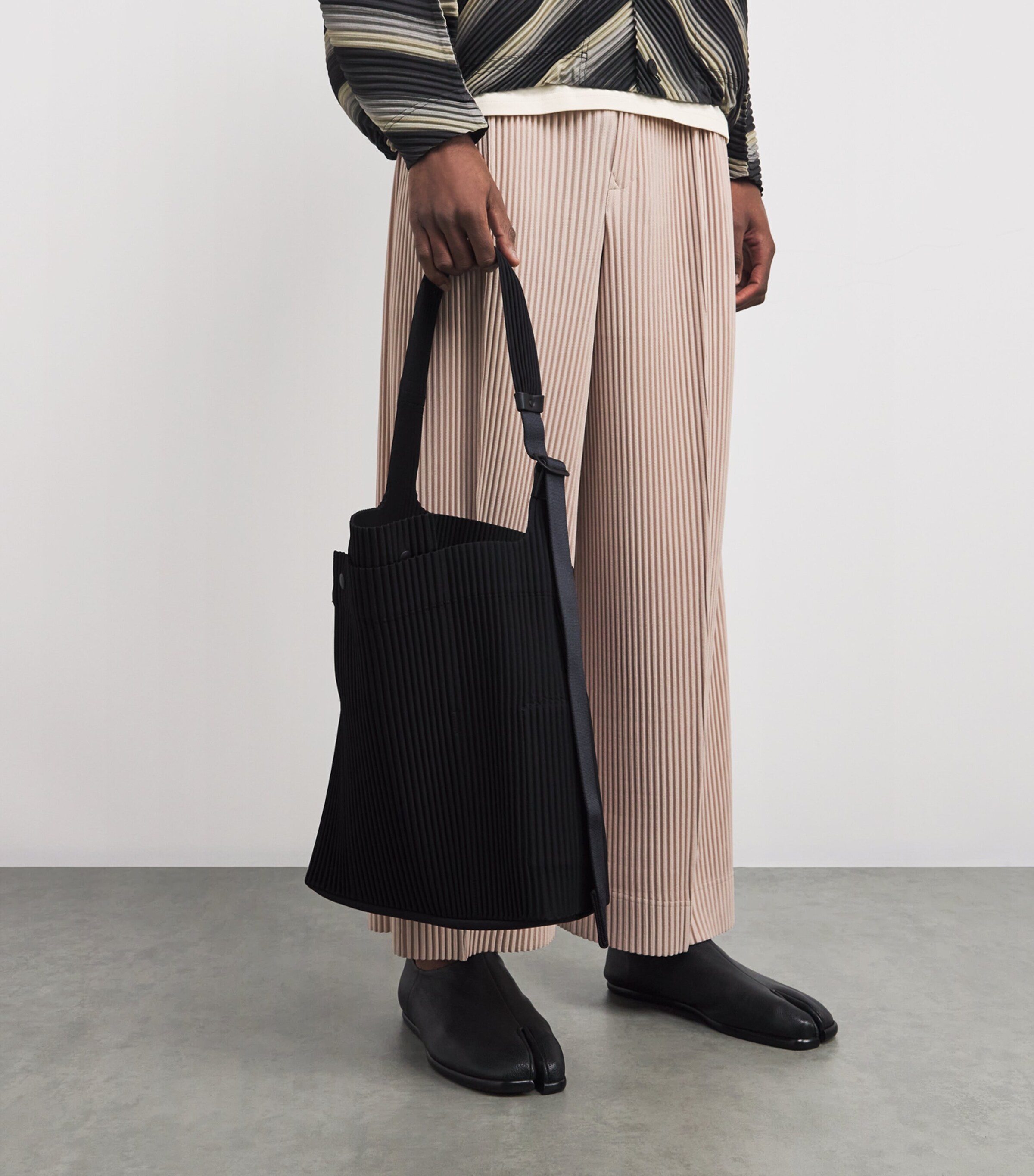 Homme Plisse Utility Bag in Black Curated at Jake and Jones