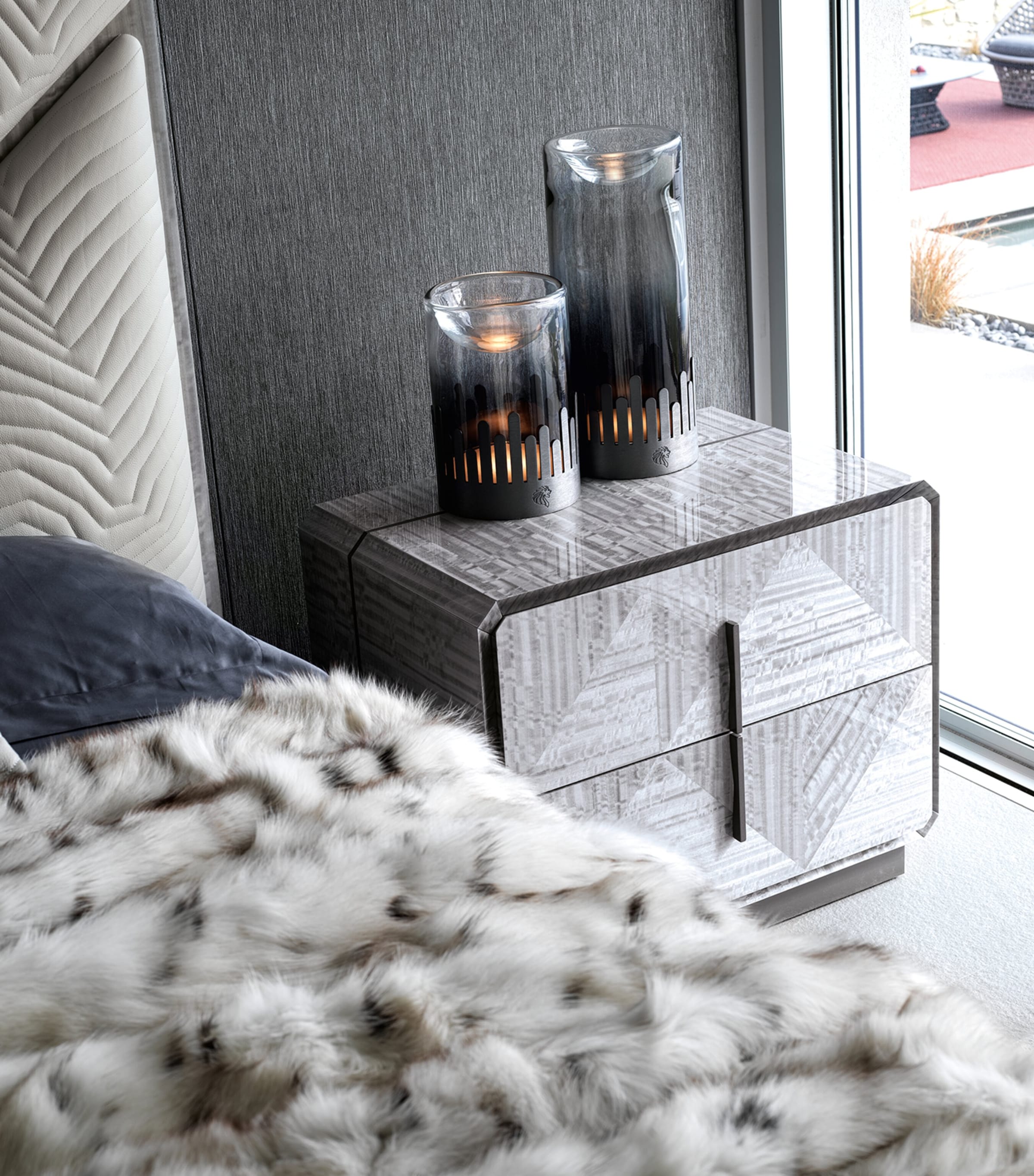 Moonlight bedside table with candles on top